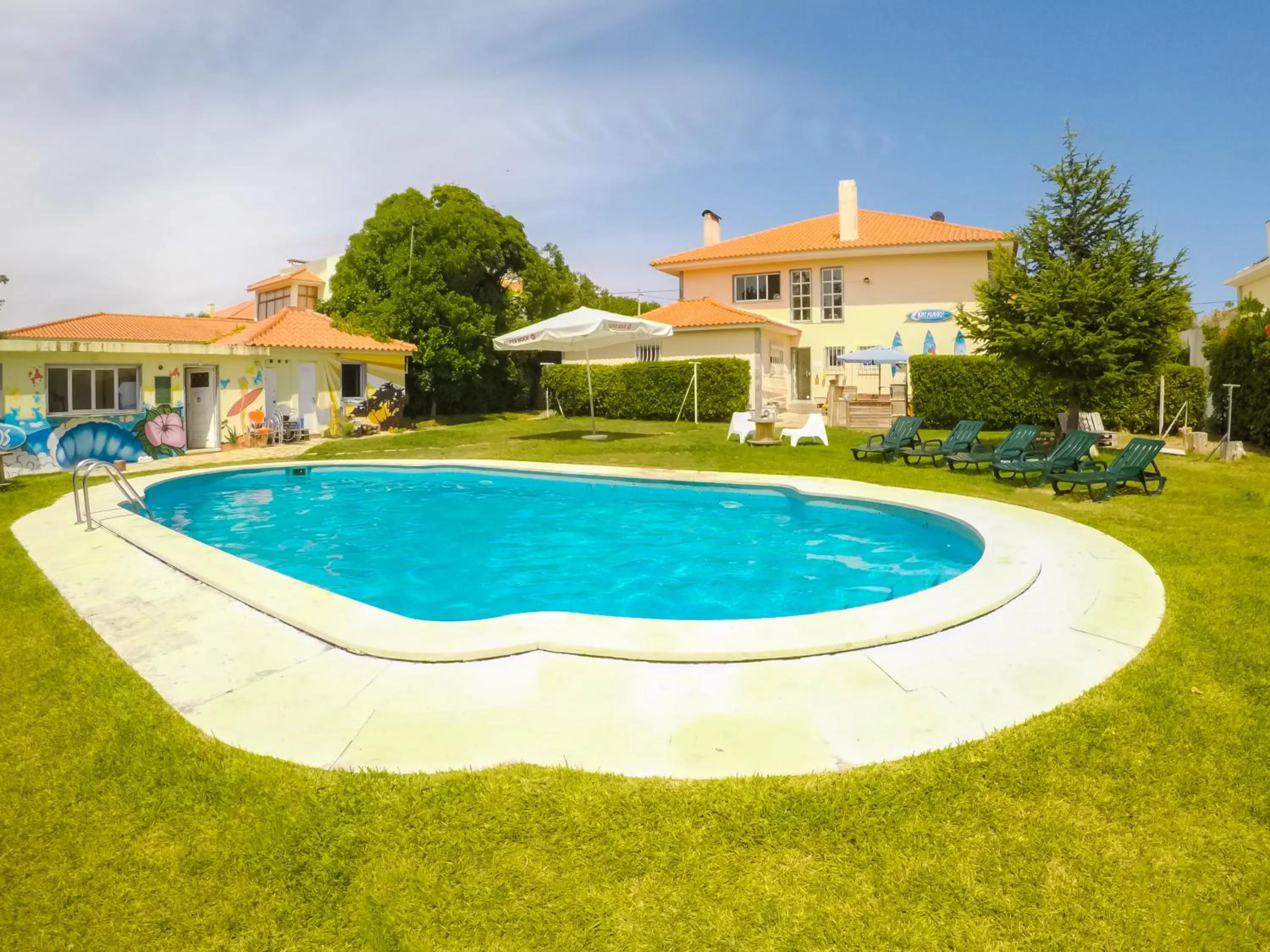Swimming pool in Carcavelos Surf Hostel and Surf Camp