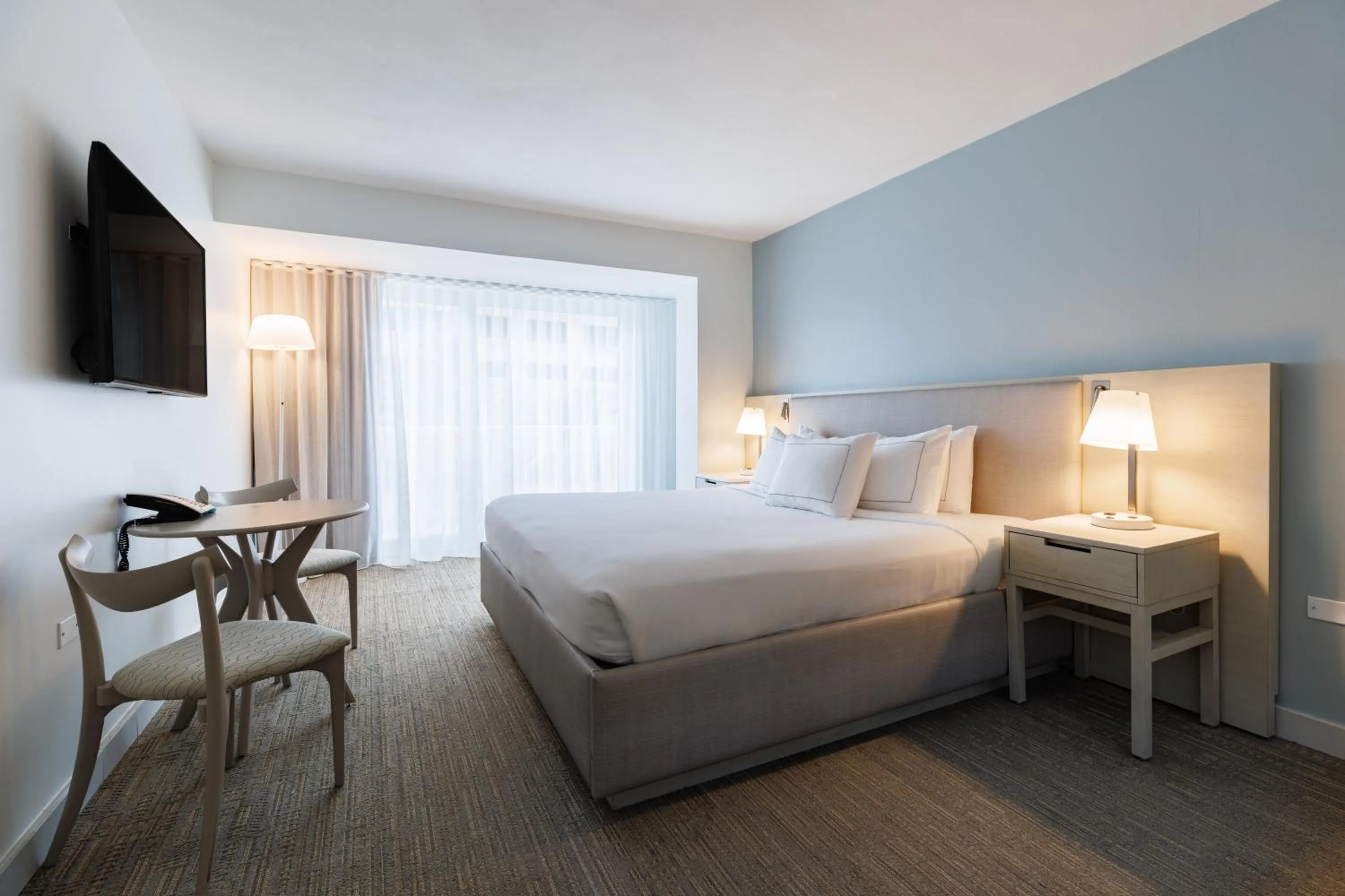 Bed in Condado Palm Inn San Juan, Tapestry Collection by Hilton