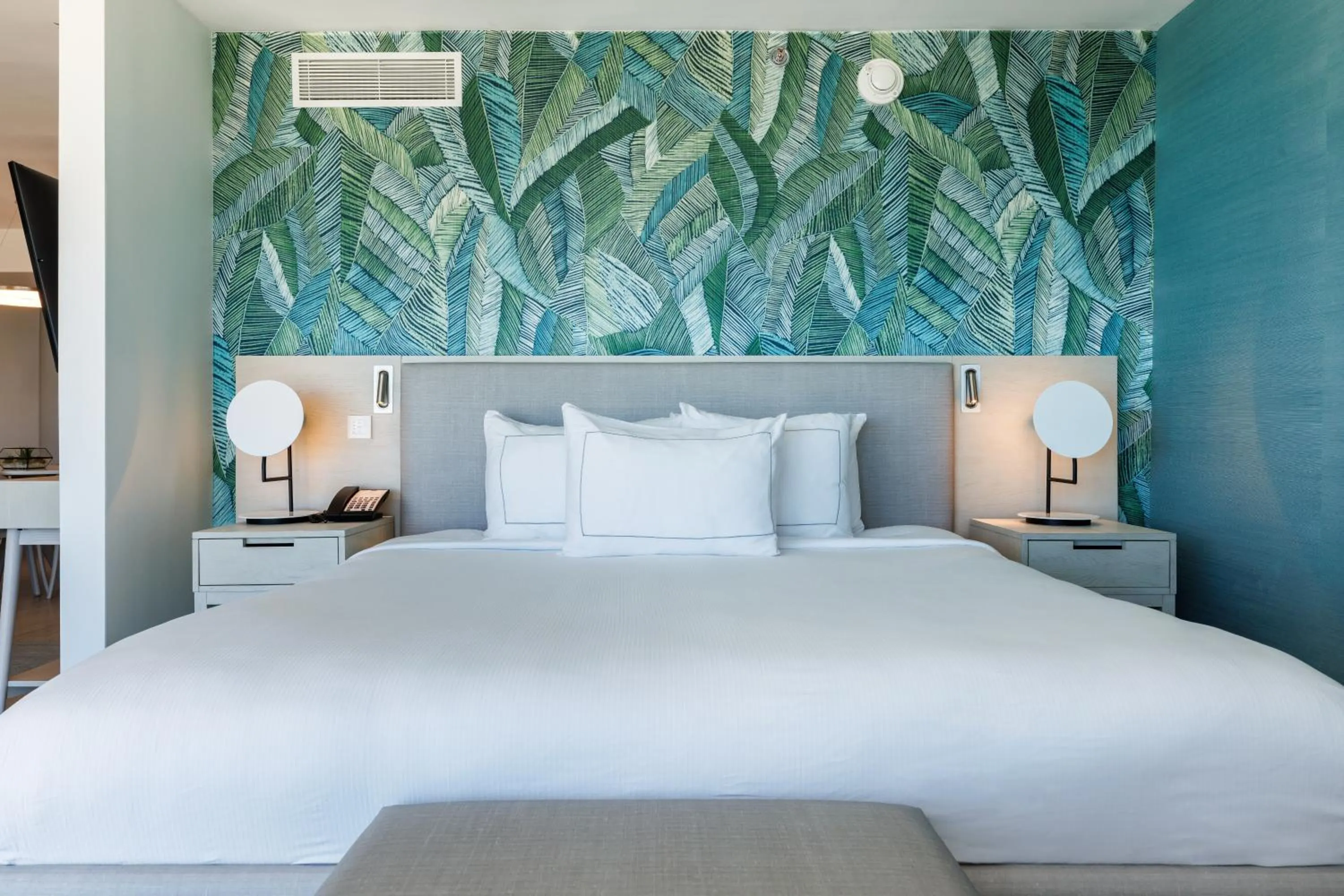 Bed in Condado Palm Inn San Juan, Tapestry Collection by Hilton
