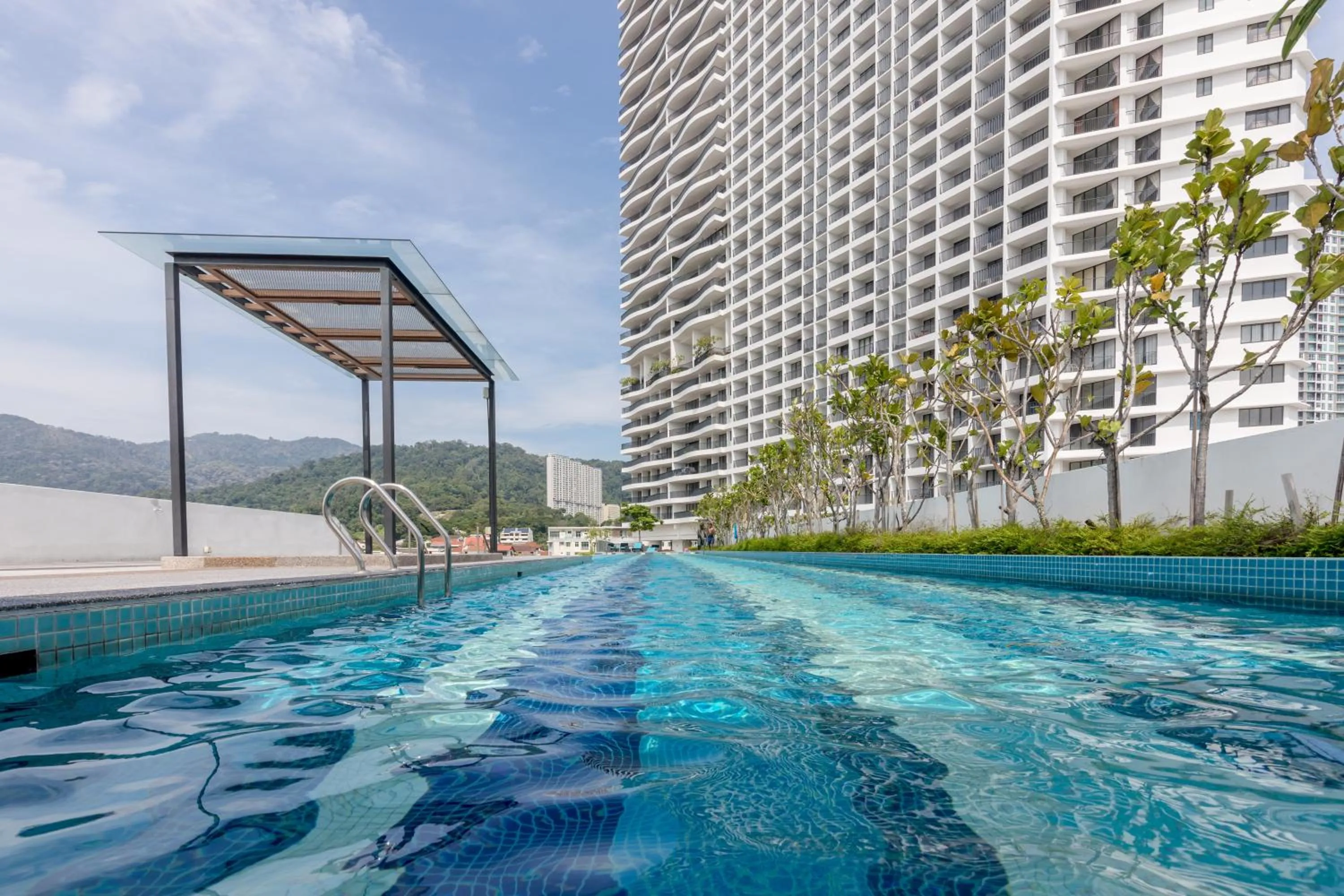 Swimming pool in The Landmark Condo, by Sanguine