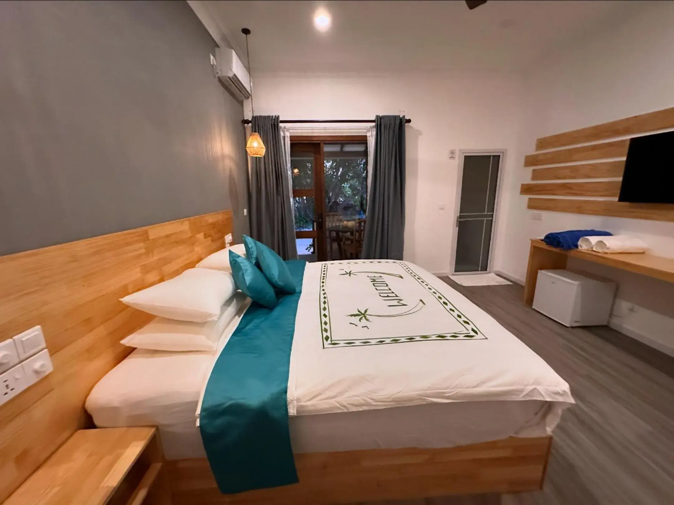 Bed in Dhigurah Beach Inn Bed in Dhigurah Beach Inn