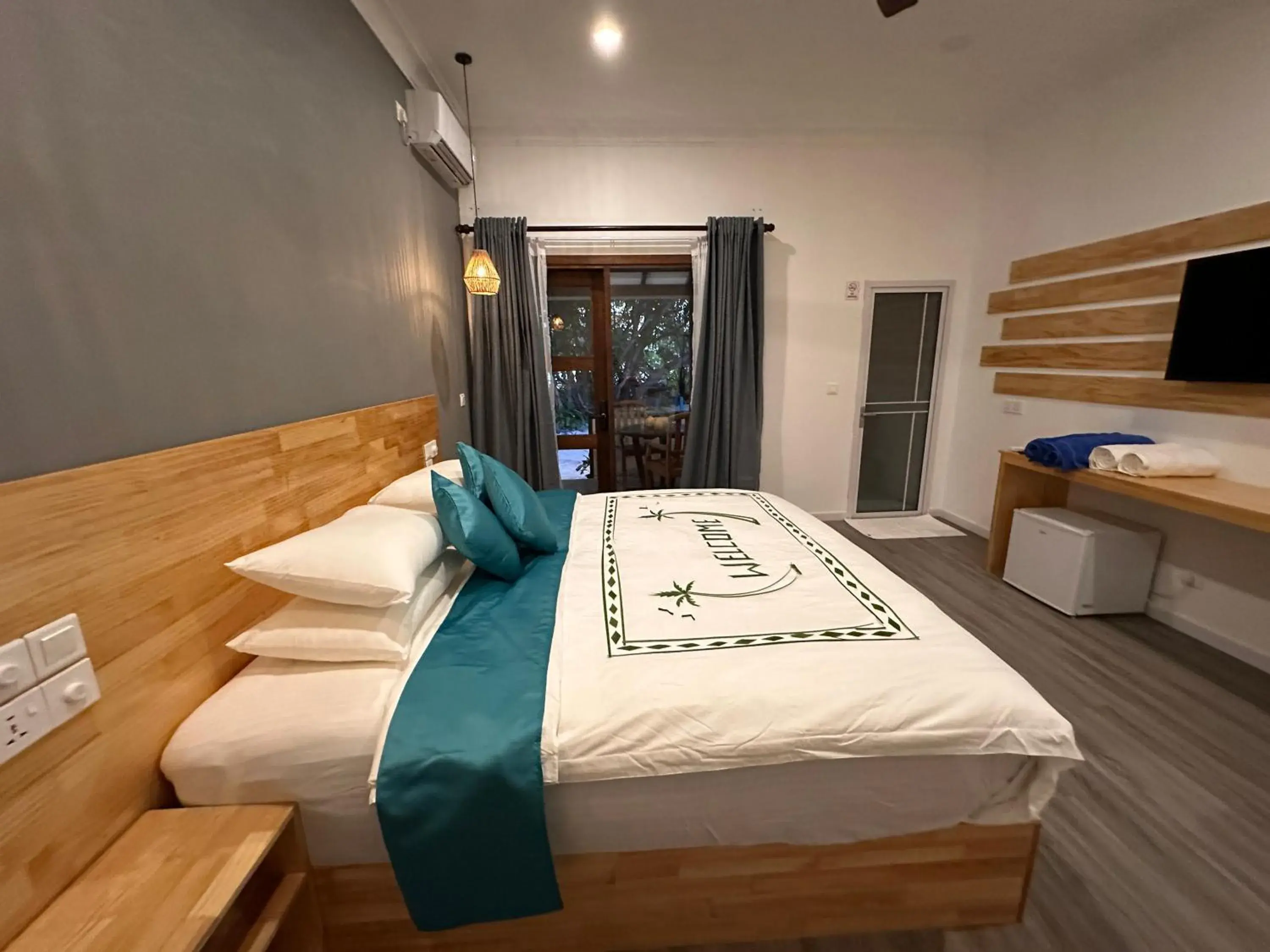 Bed in Dhigurah Beach Inn Bed in Dhigurah Beach Inn