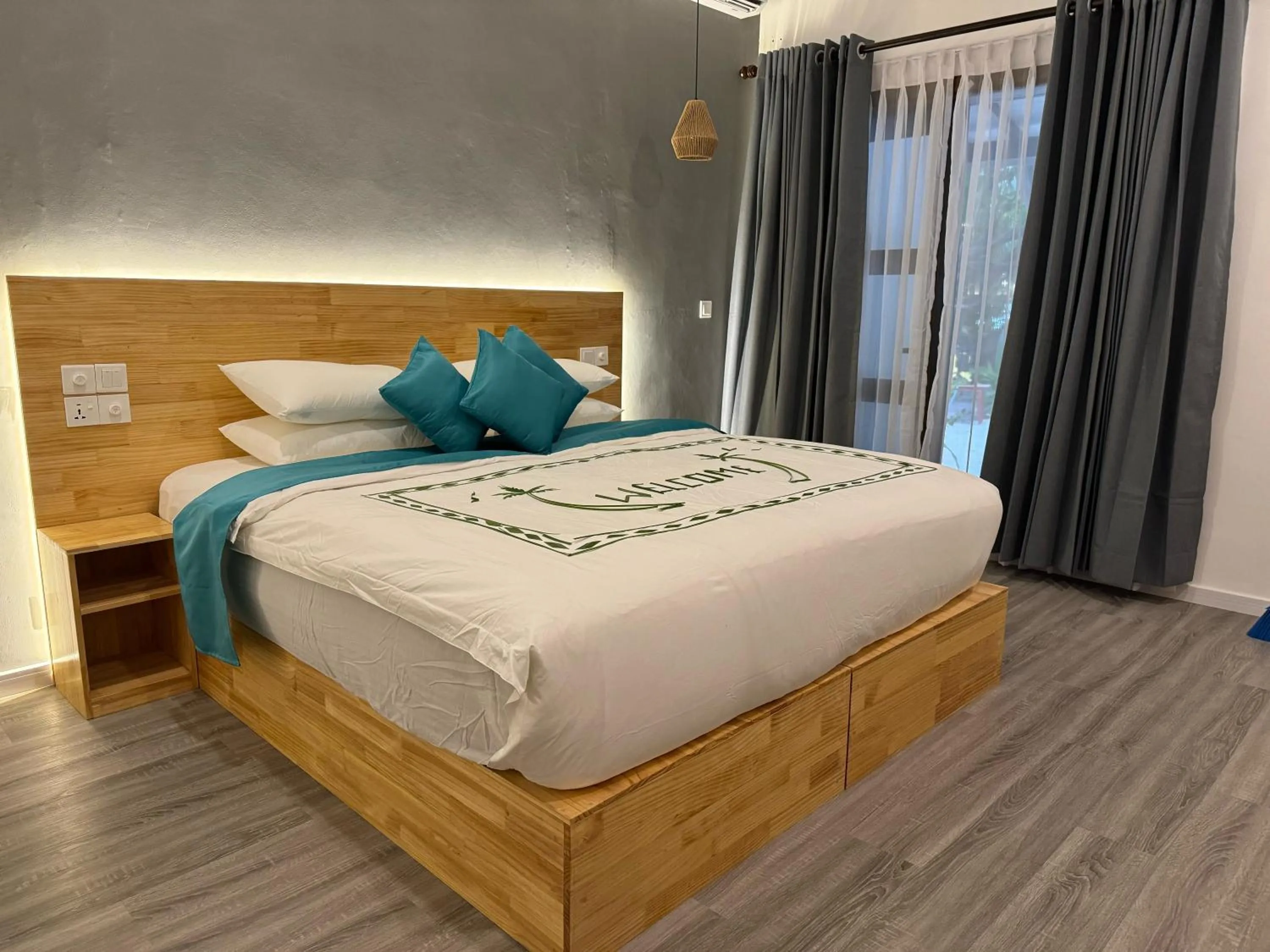 Bed in Dhigurah Beach Inn