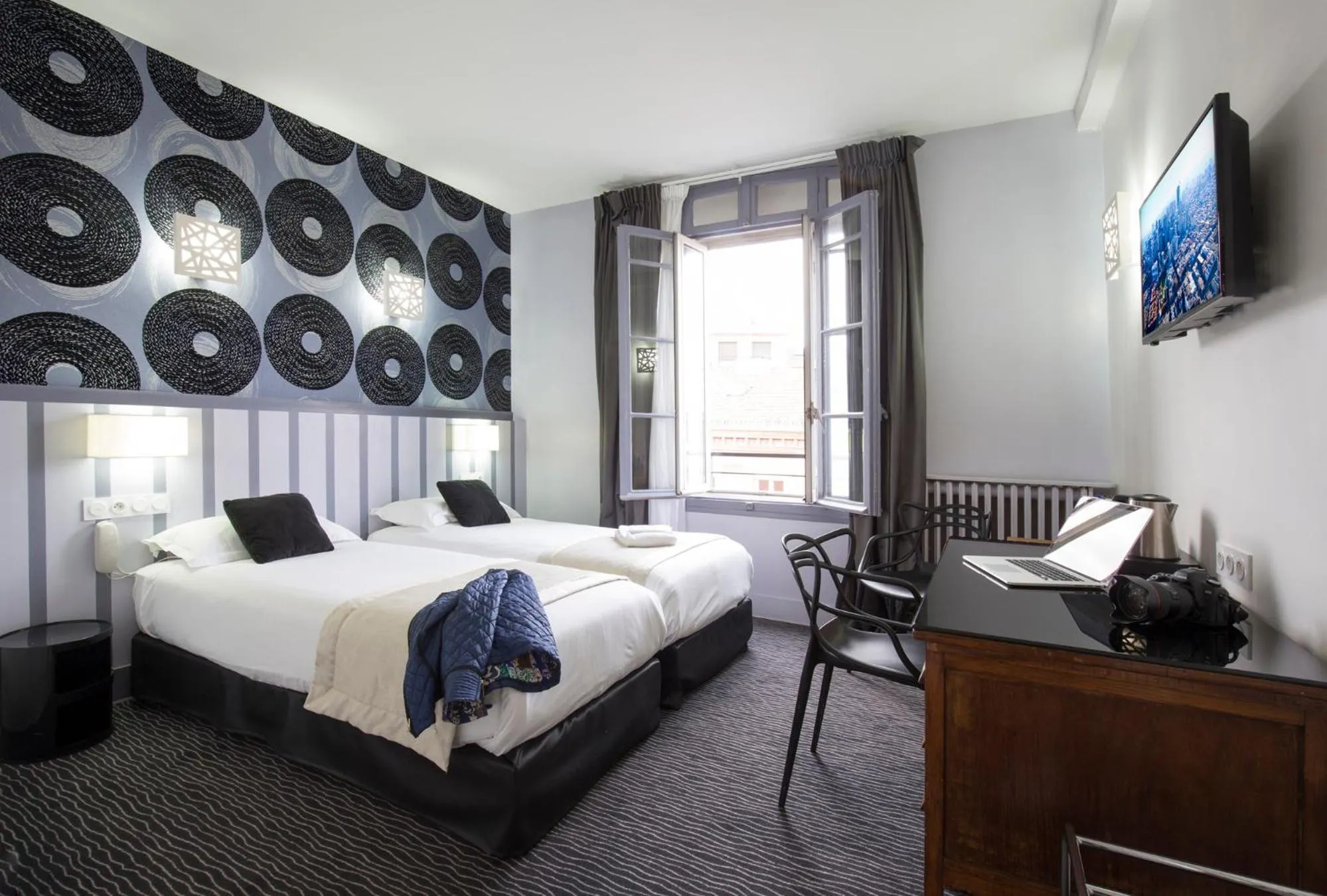 Bedroom in Hôtel Raymond 4 Toulouse