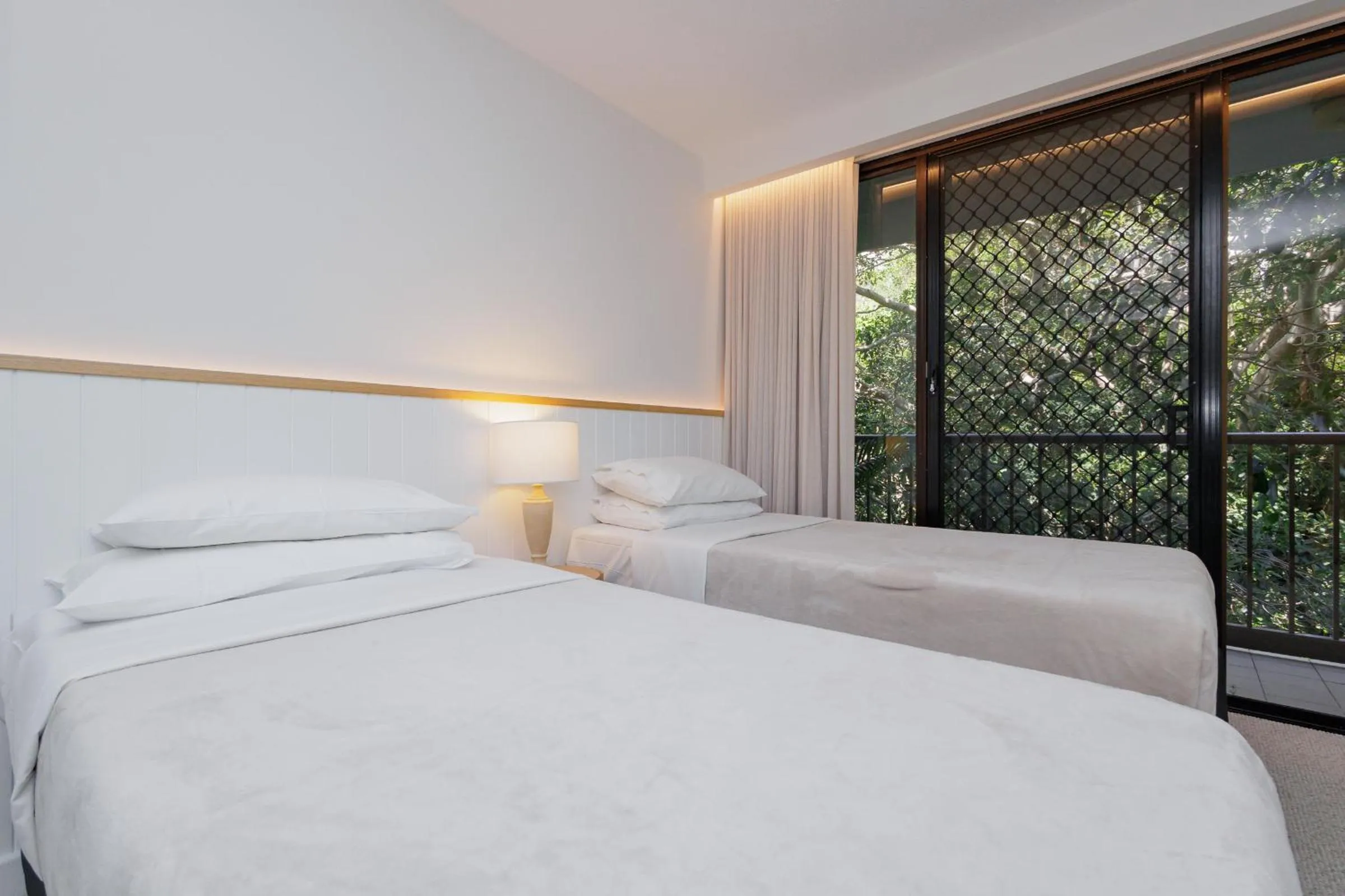 Bedroom, Bed in The Rocks Resort - Official