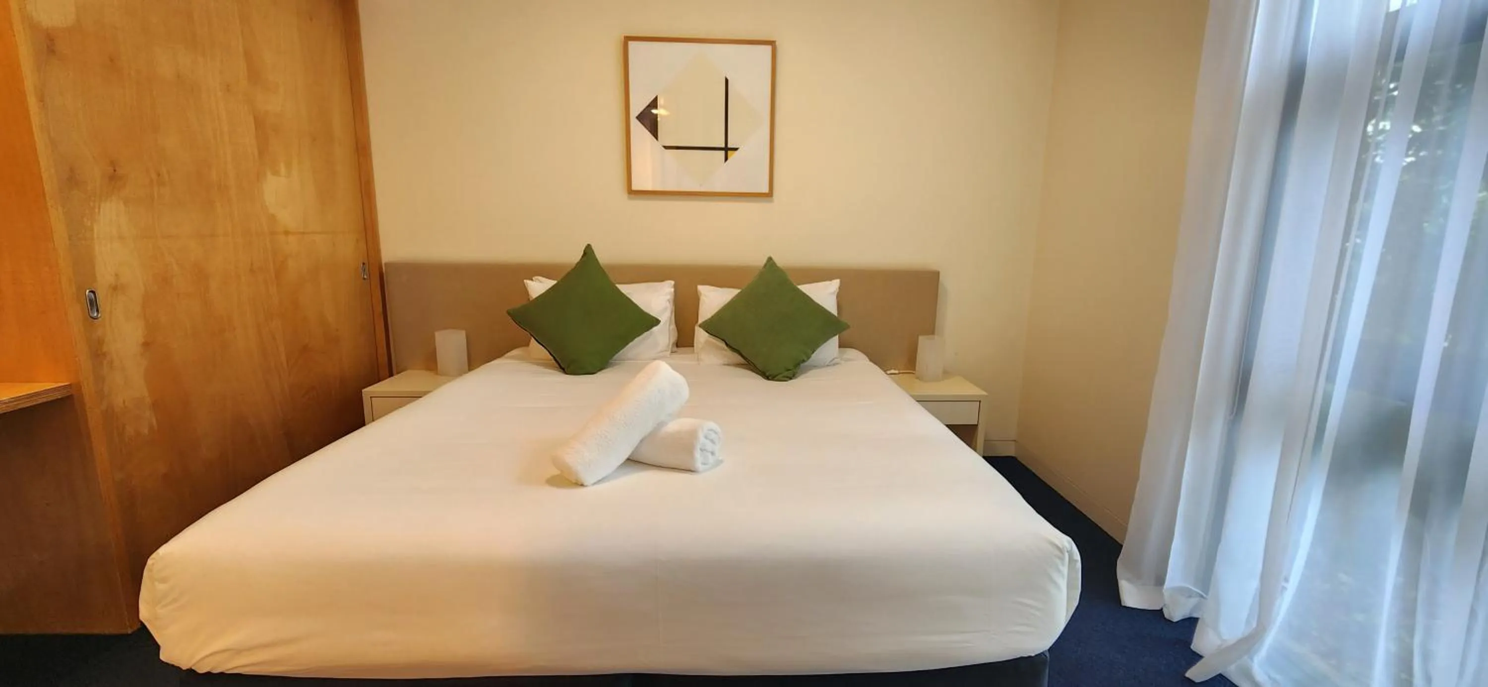 Bed in Phillip Island Apartments