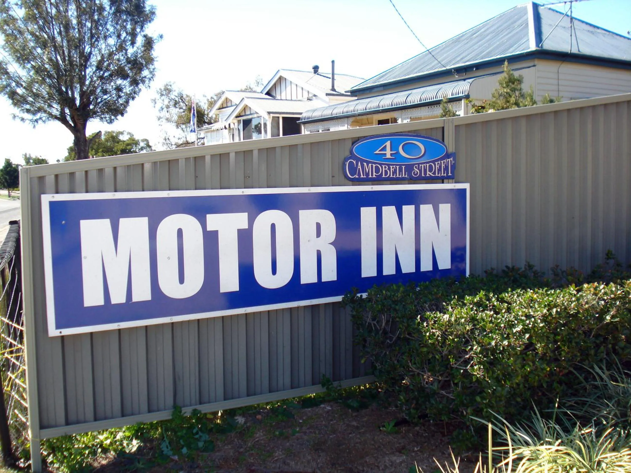 Property logo or sign in Oakey Motor Inn