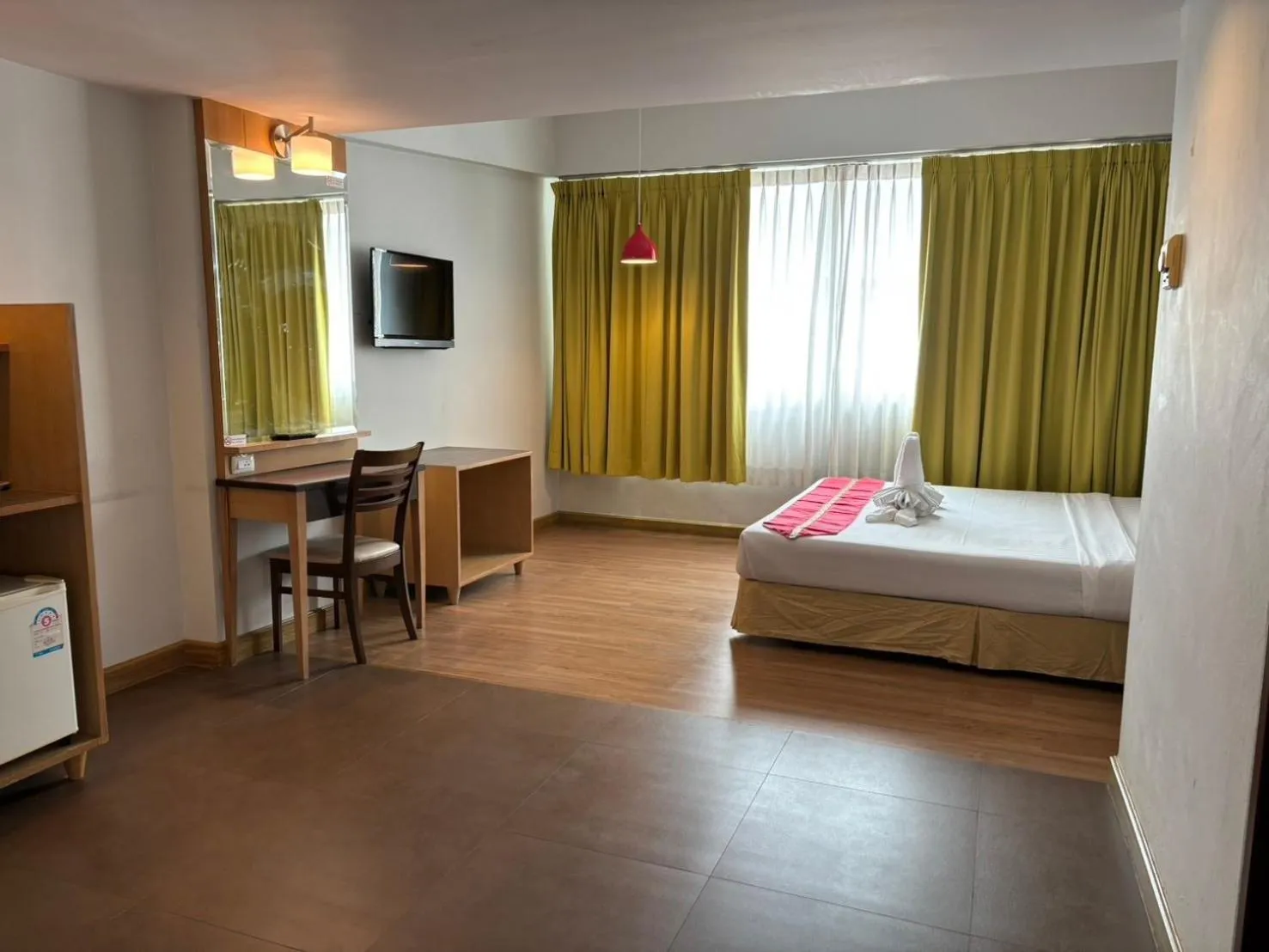 Bed in Aloha Hatyai Hotel