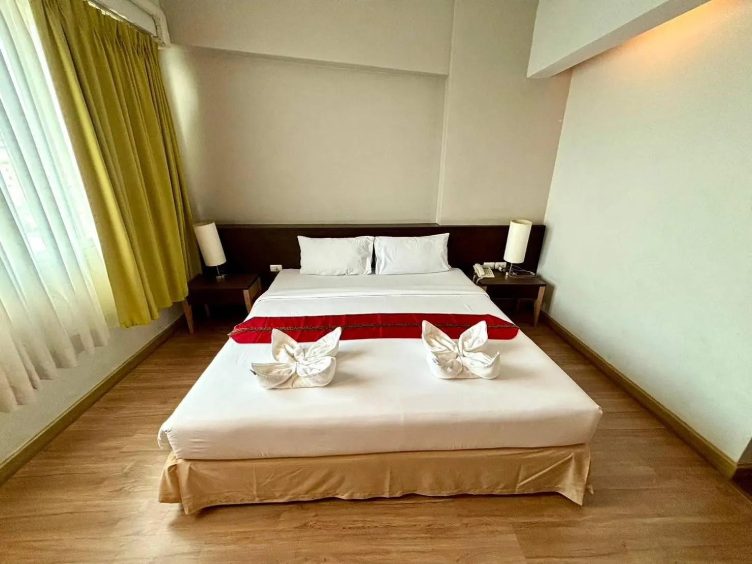 Bed in Aloha Hatyai Hotel