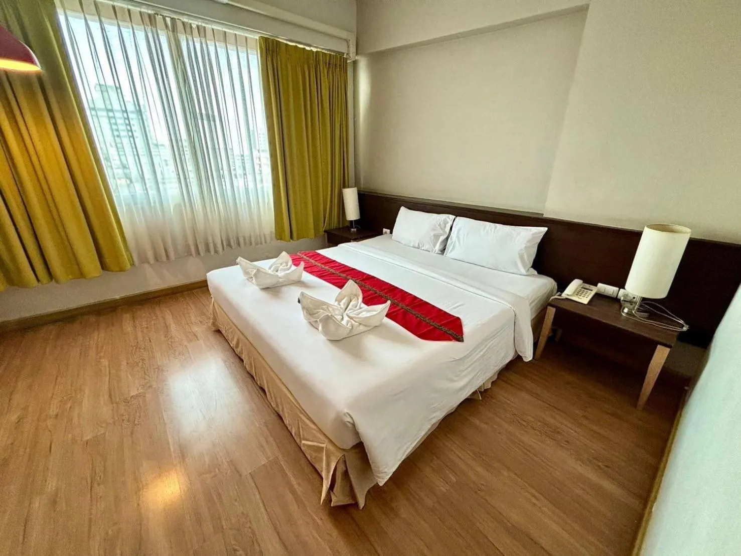 Bed in Aloha Hatyai Hotel