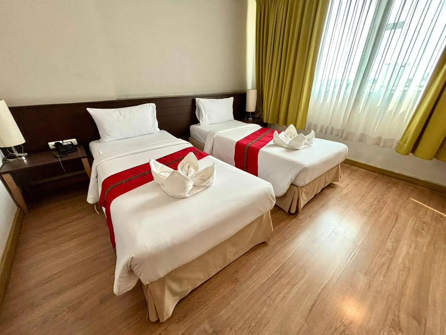 Bed in Aloha Hatyai Hotel