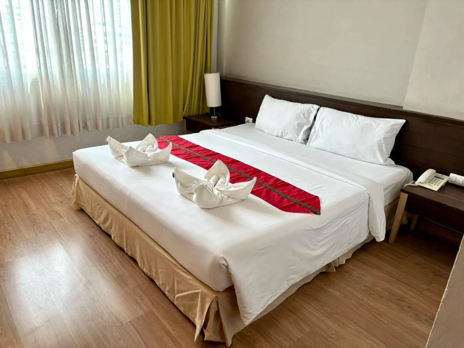 Bed in Aloha Hatyai Hotel