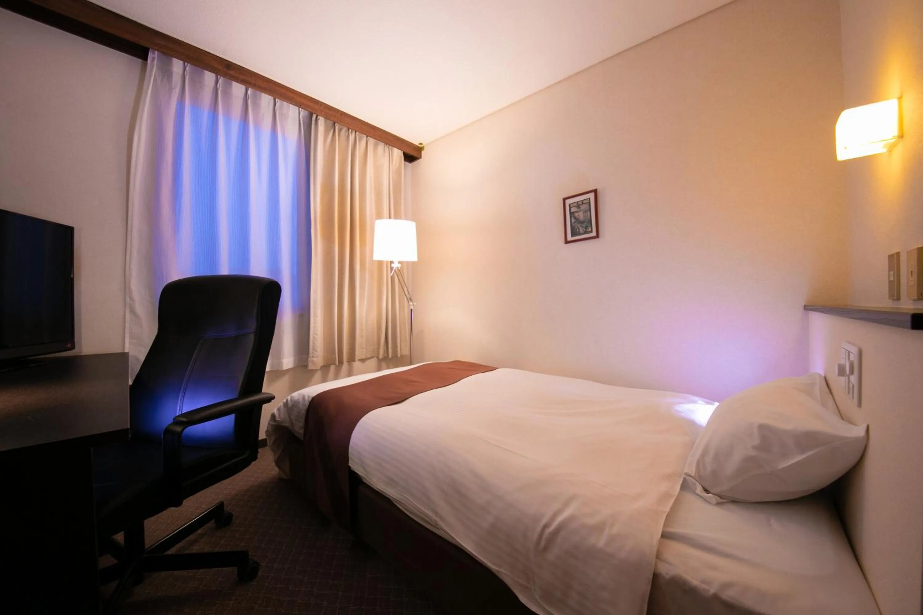 Bed in Ninohe City Hotel