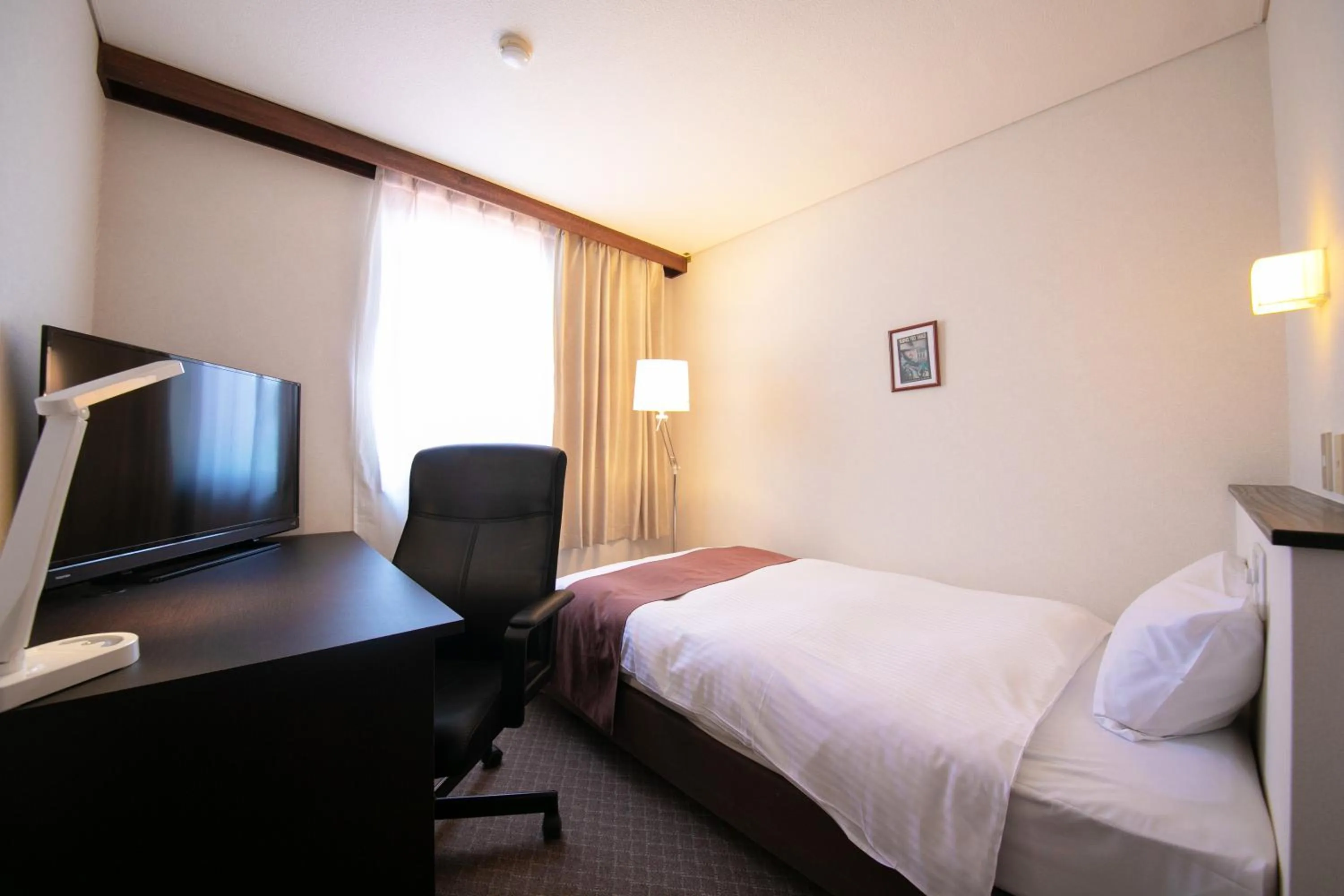 Bed in Ninohe City Hotel