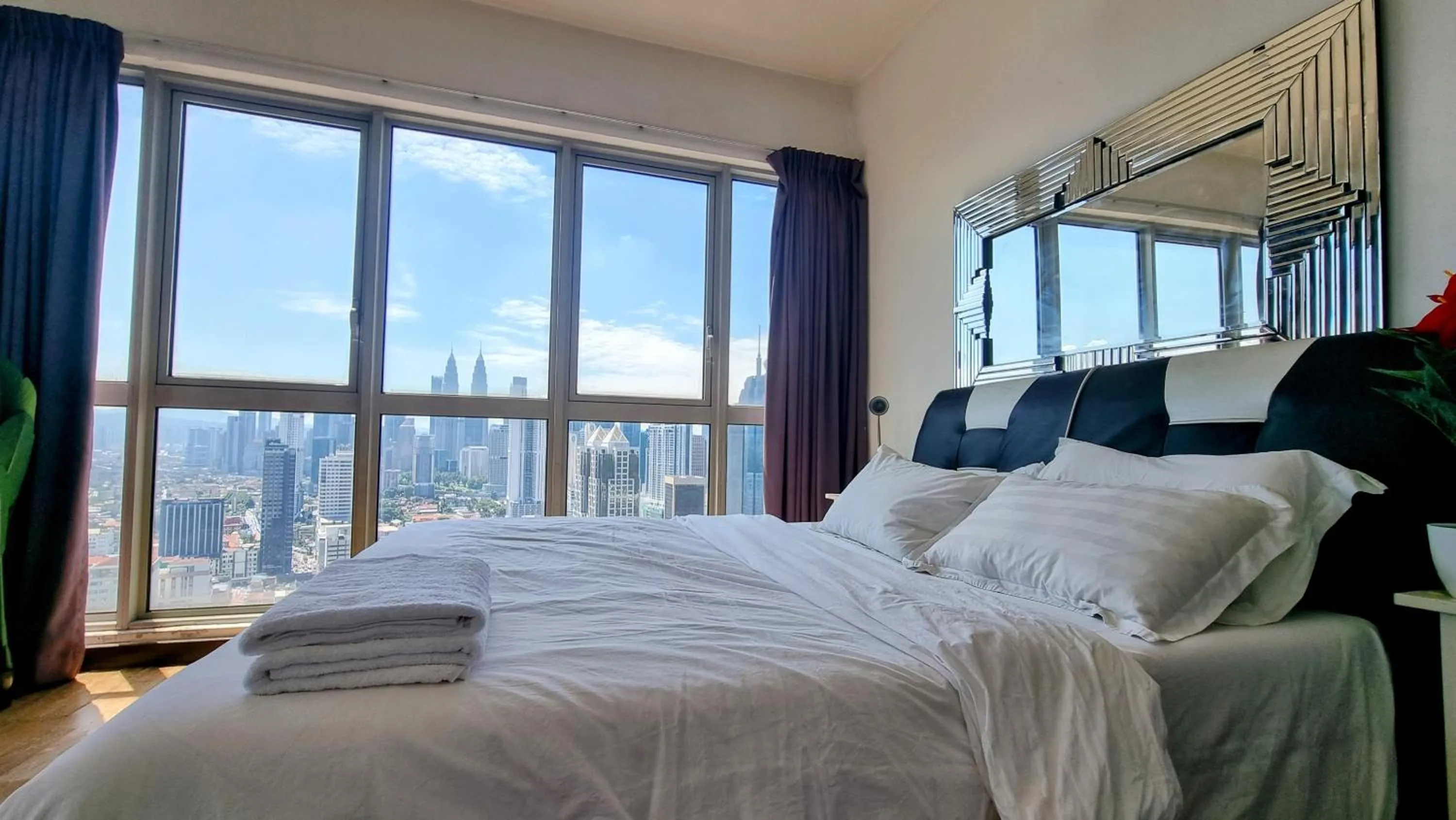 Bed in Penthouse on 34 - The Highest Unit and Best Views in Regalia & Private Rooftop Terrace