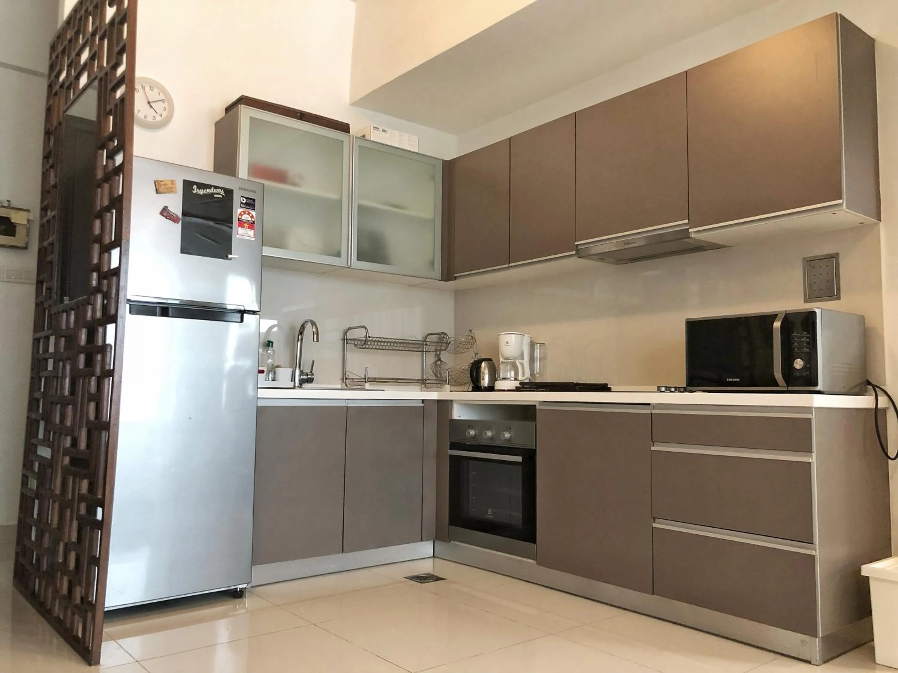 Communal kitchen in Penthouse on 34 - The Highest Unit and Best Views in Regalia & Private Rooftop Terrace