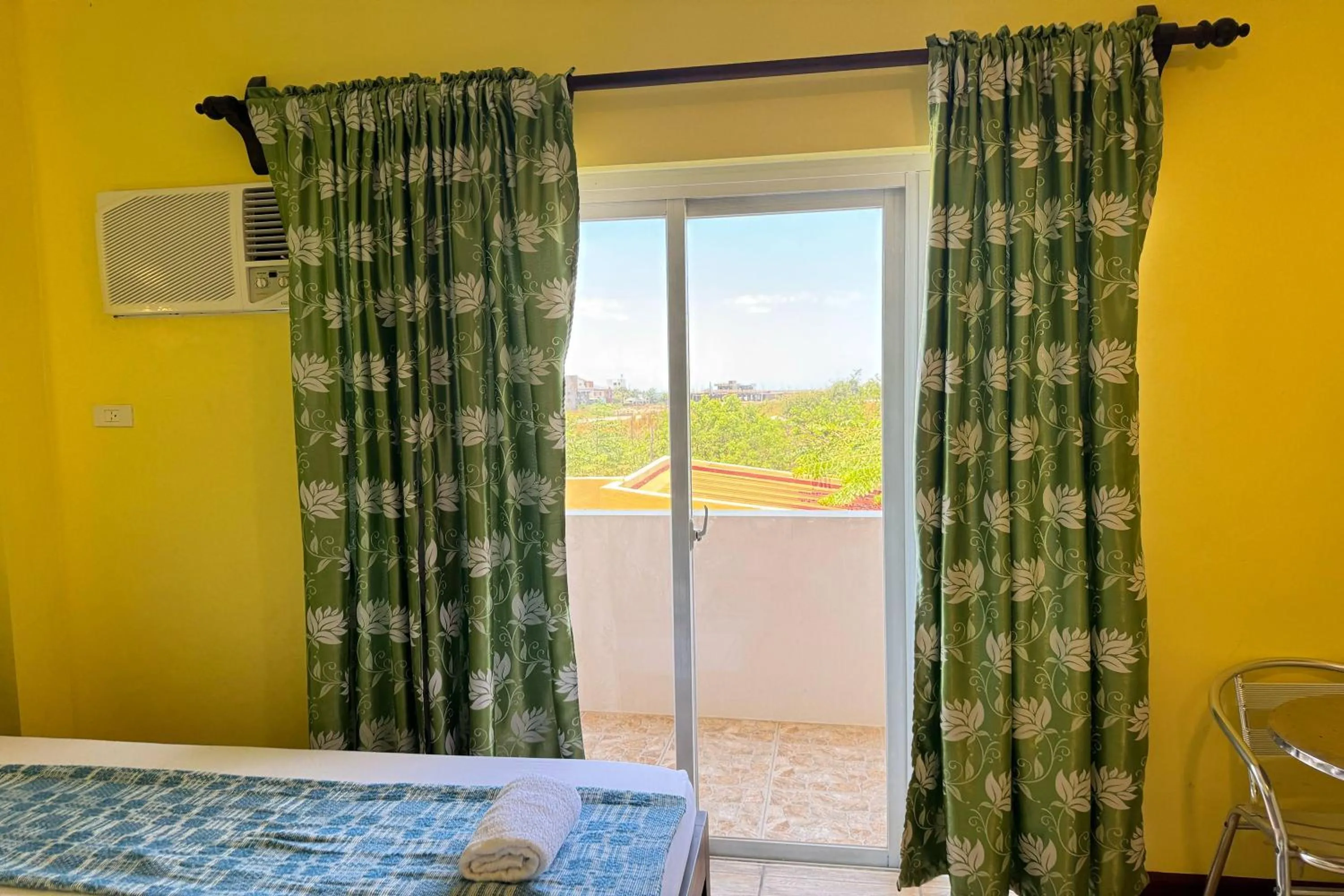 Balcony/Terrace, Bed in OveMar Resort Hotel near Vigan