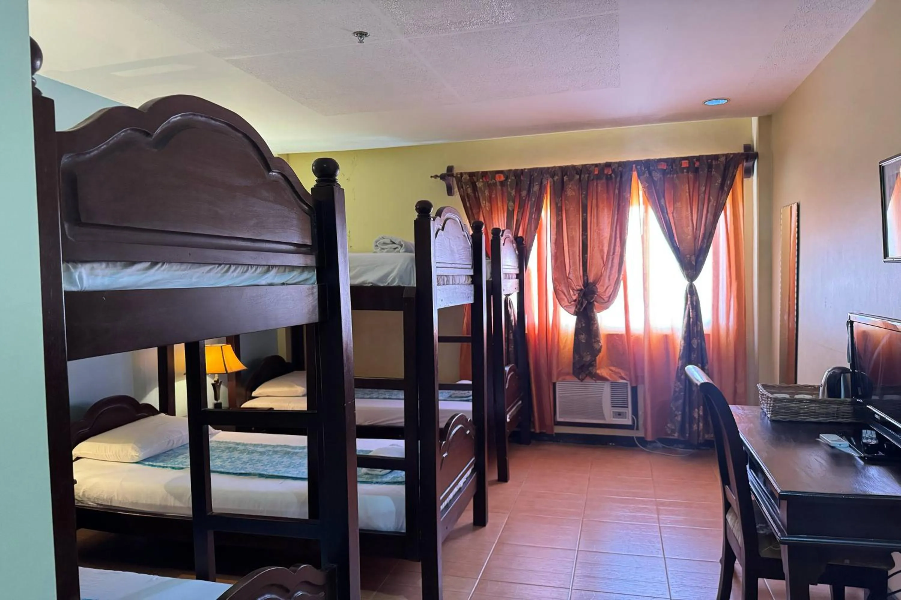 Bed in OveMar Resort Hotel near Vigan