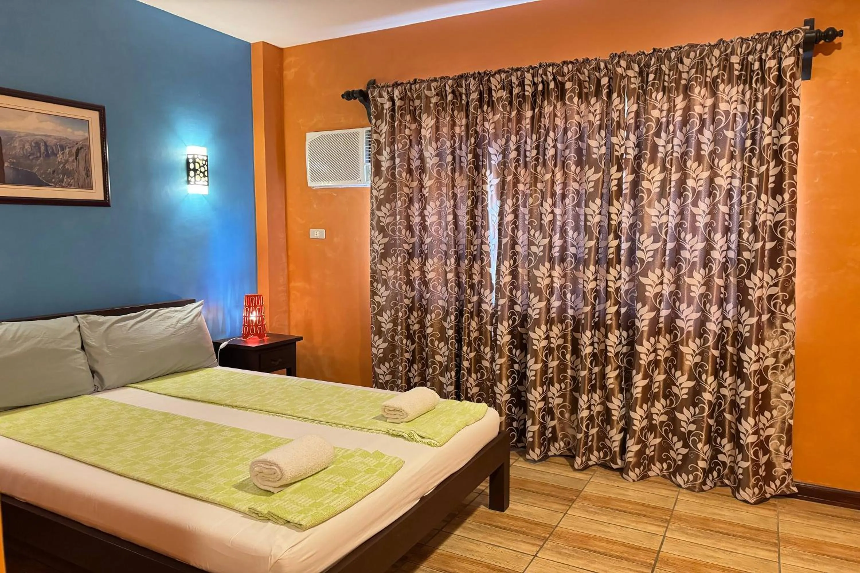 Bed in OveMar Resort Hotel near Vigan