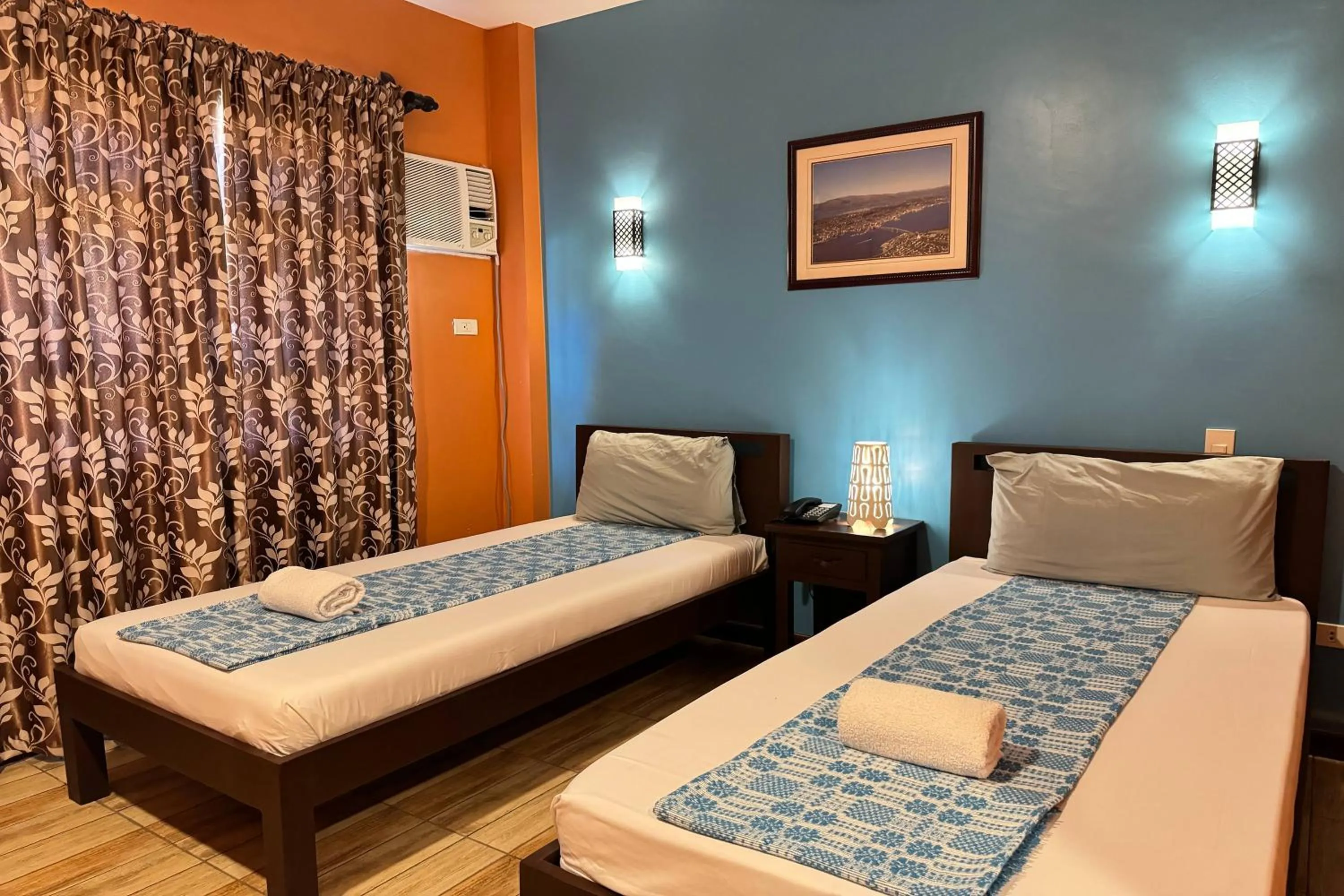 Bed in OveMar Resort Hotel near Vigan