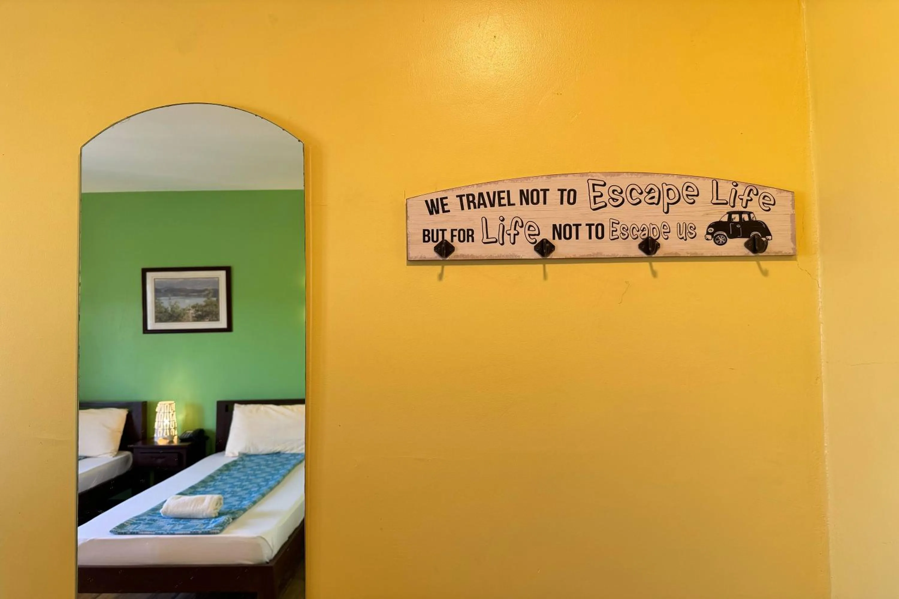 Bed in OveMar Resort Hotel near Vigan