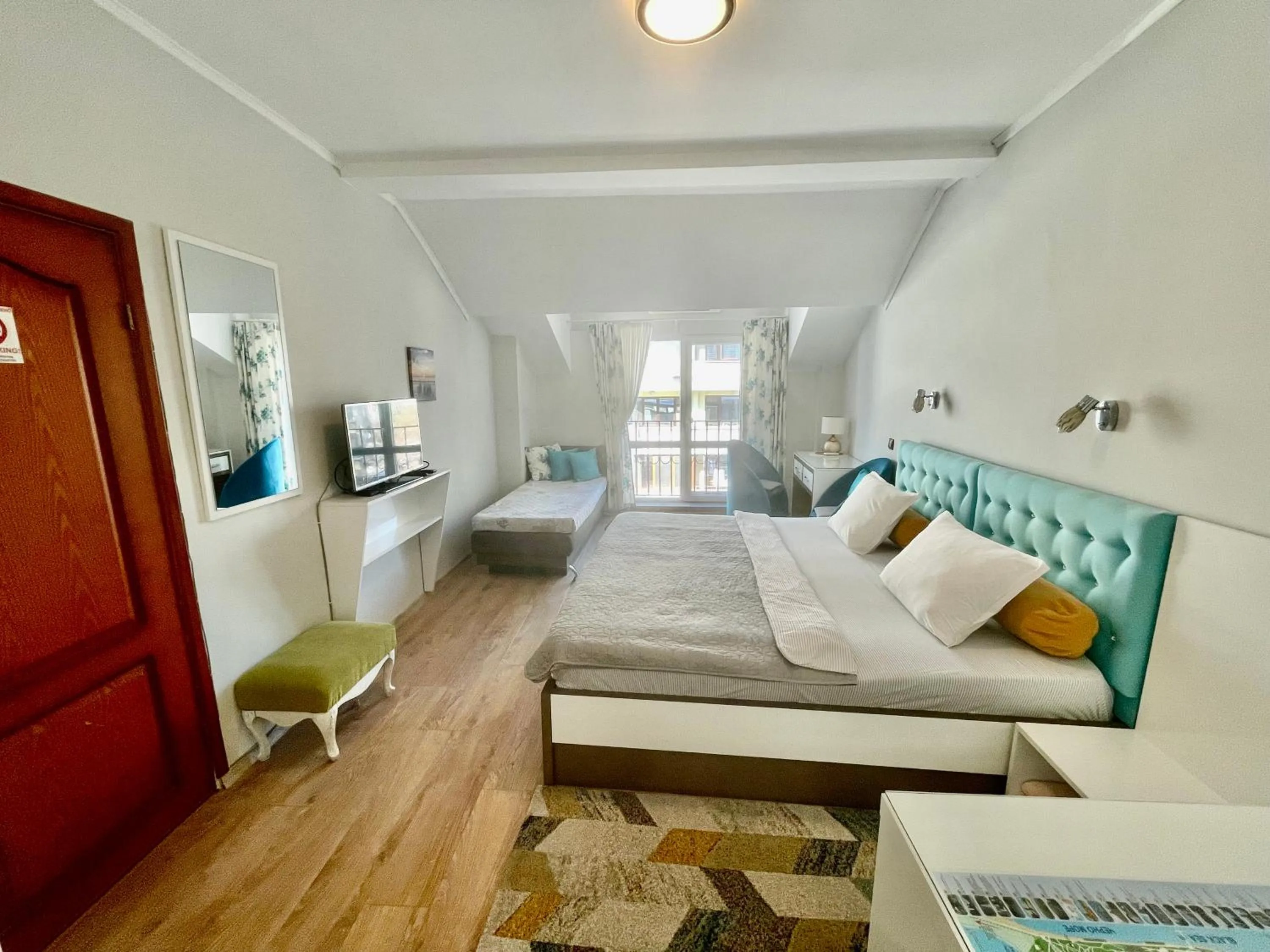 Bed in White Rose Guest Rooms