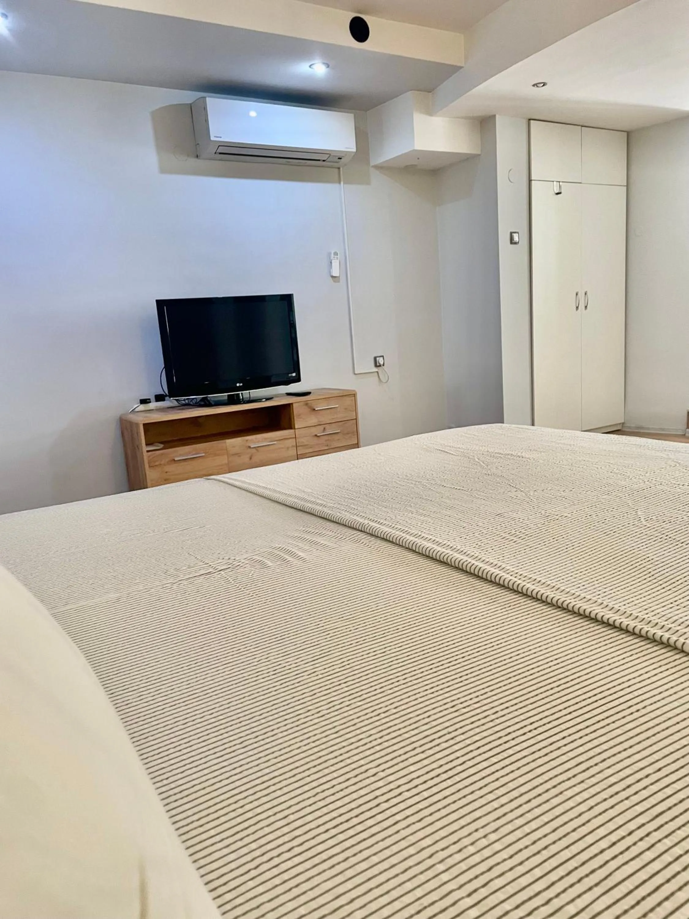 Bed in White Rose Guest Rooms