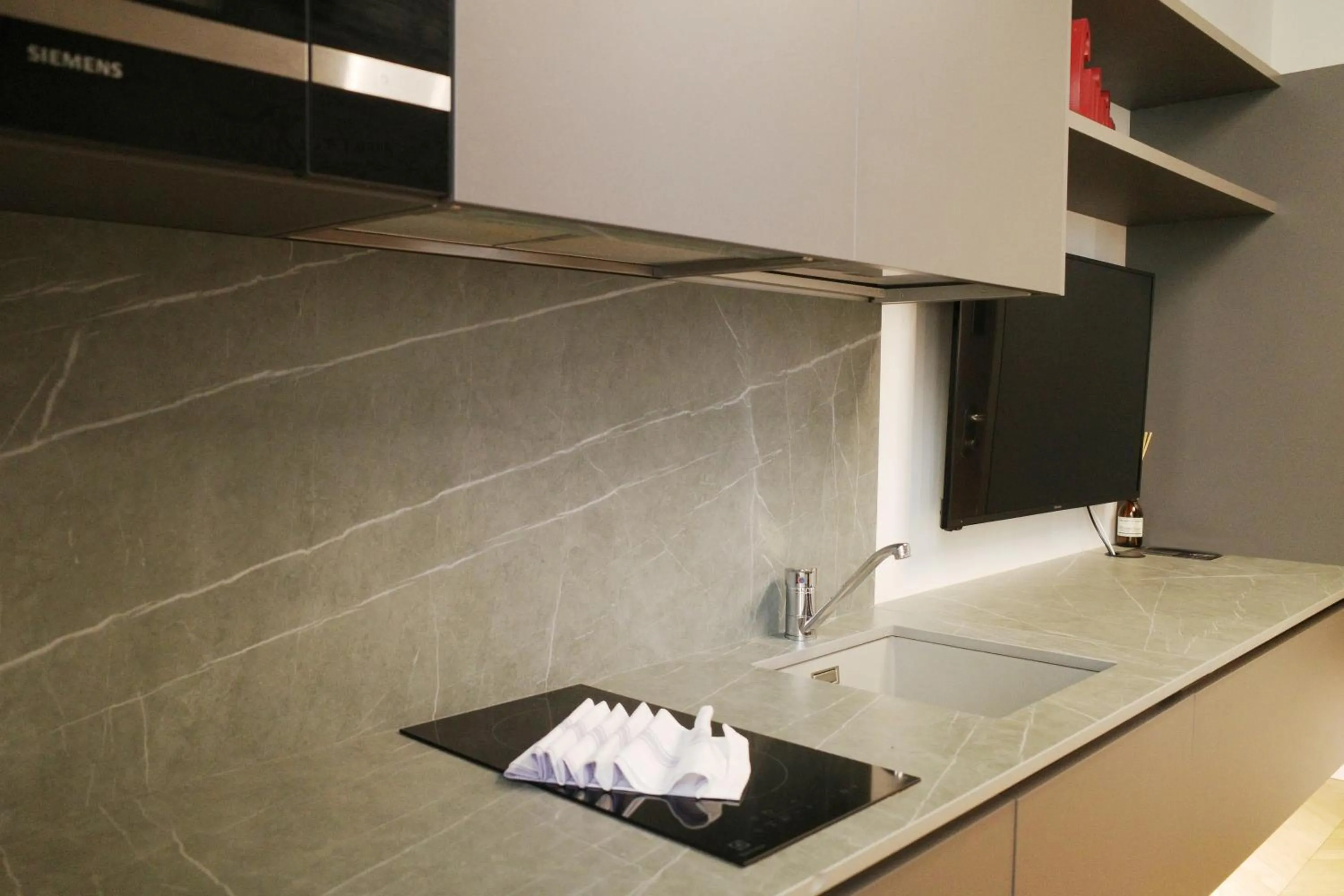 Kitchen or kitchenette in PORTA NUOVA SUITES
