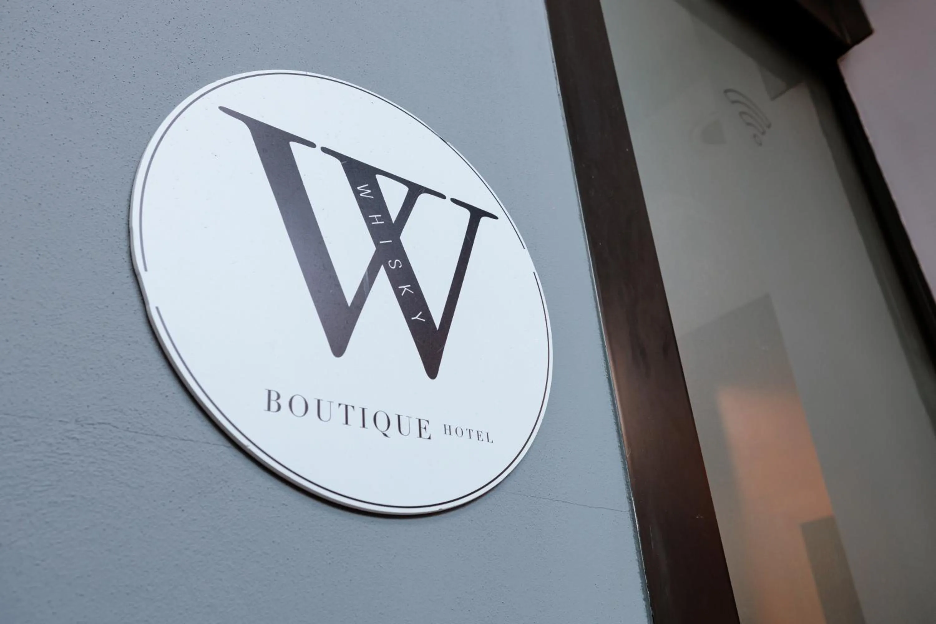 Property logo or sign in Boutique Hotel Whisky