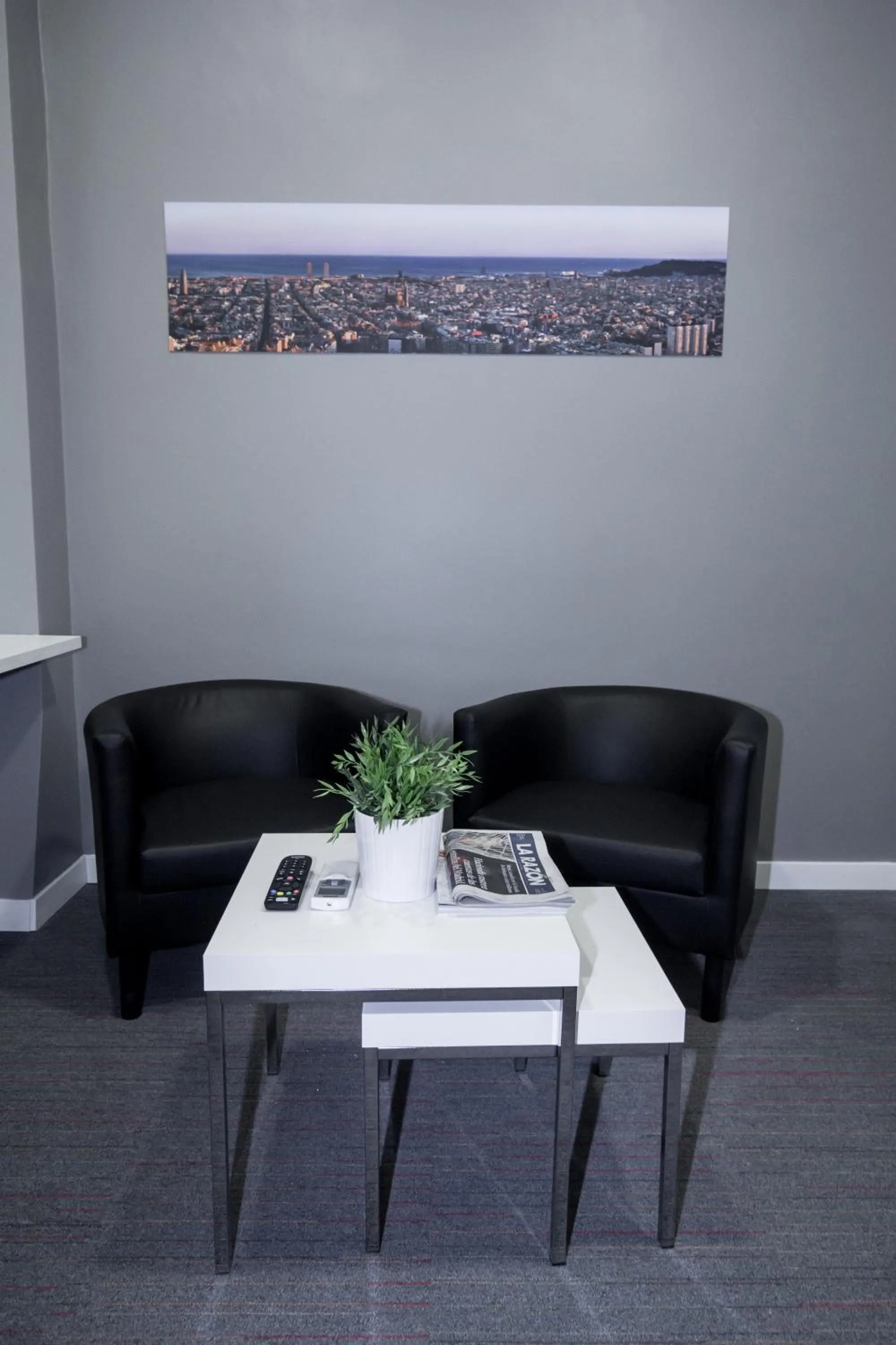 Communal lounge/ TV room in Hostalin Barcelona Gran Via