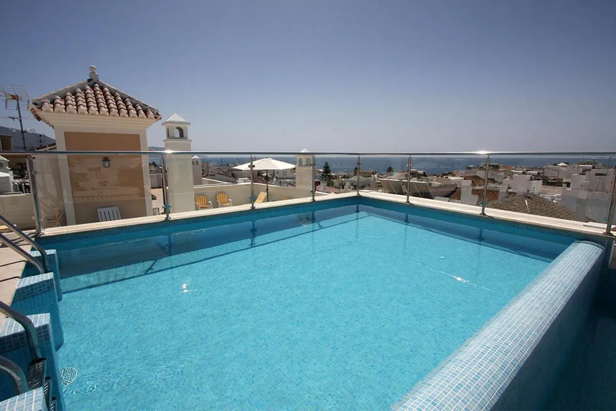 Swimming pool in Apartamentos La Botica de Nerja