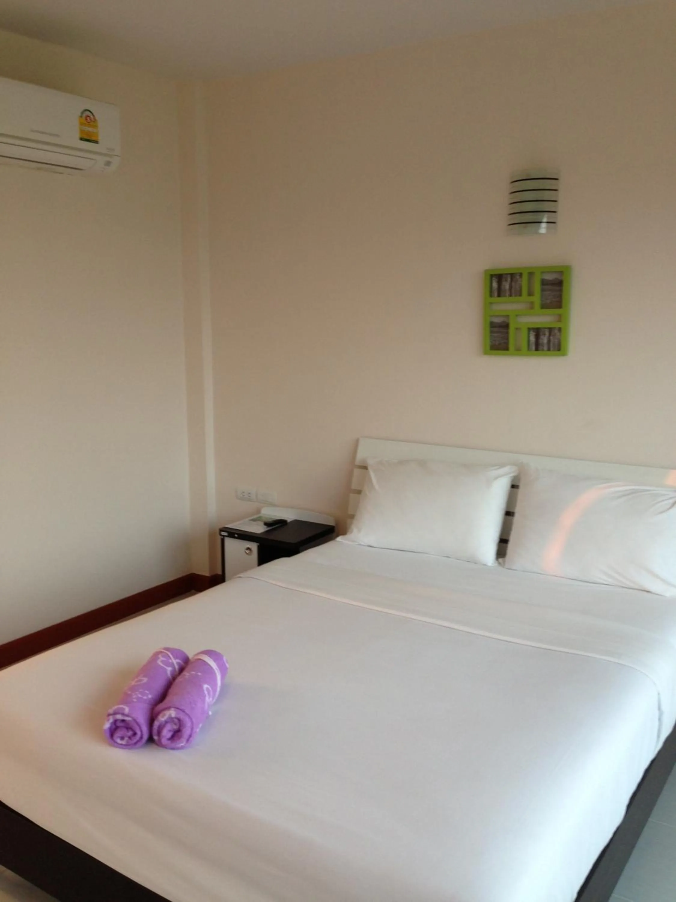 Bed in Siriburi Resort