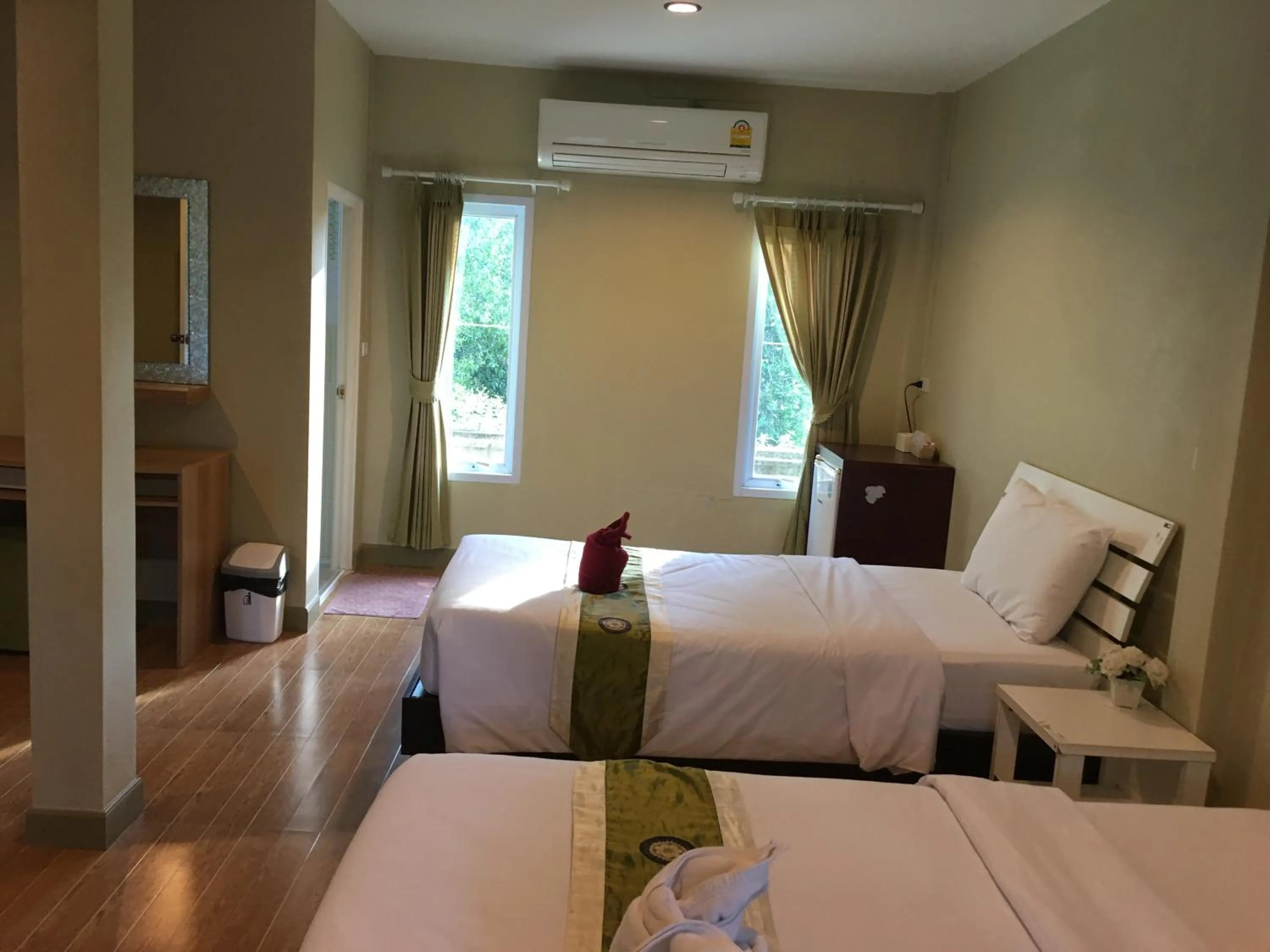 Bed in Siriburi Resort