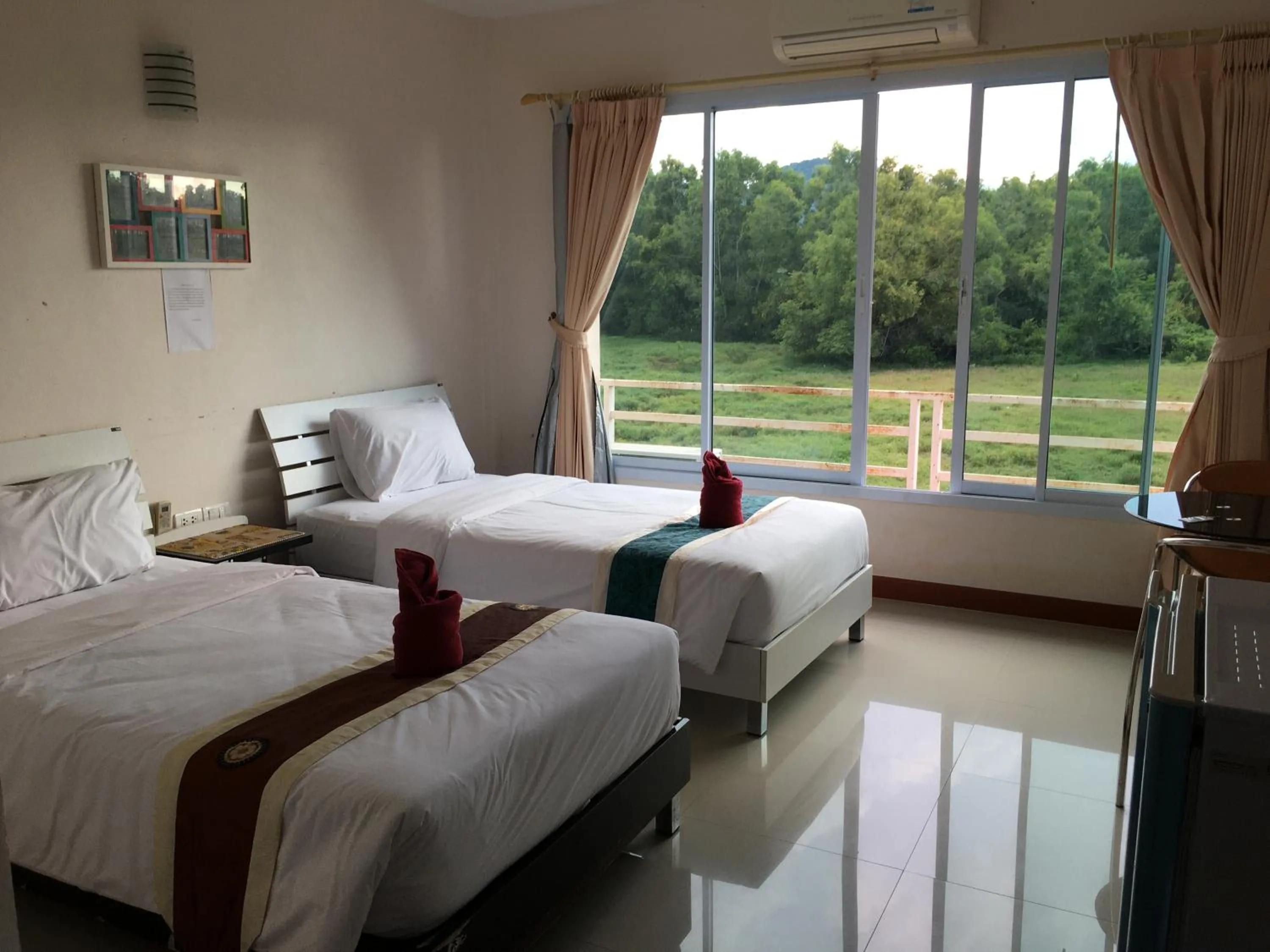 Bed in Siriburi Resort