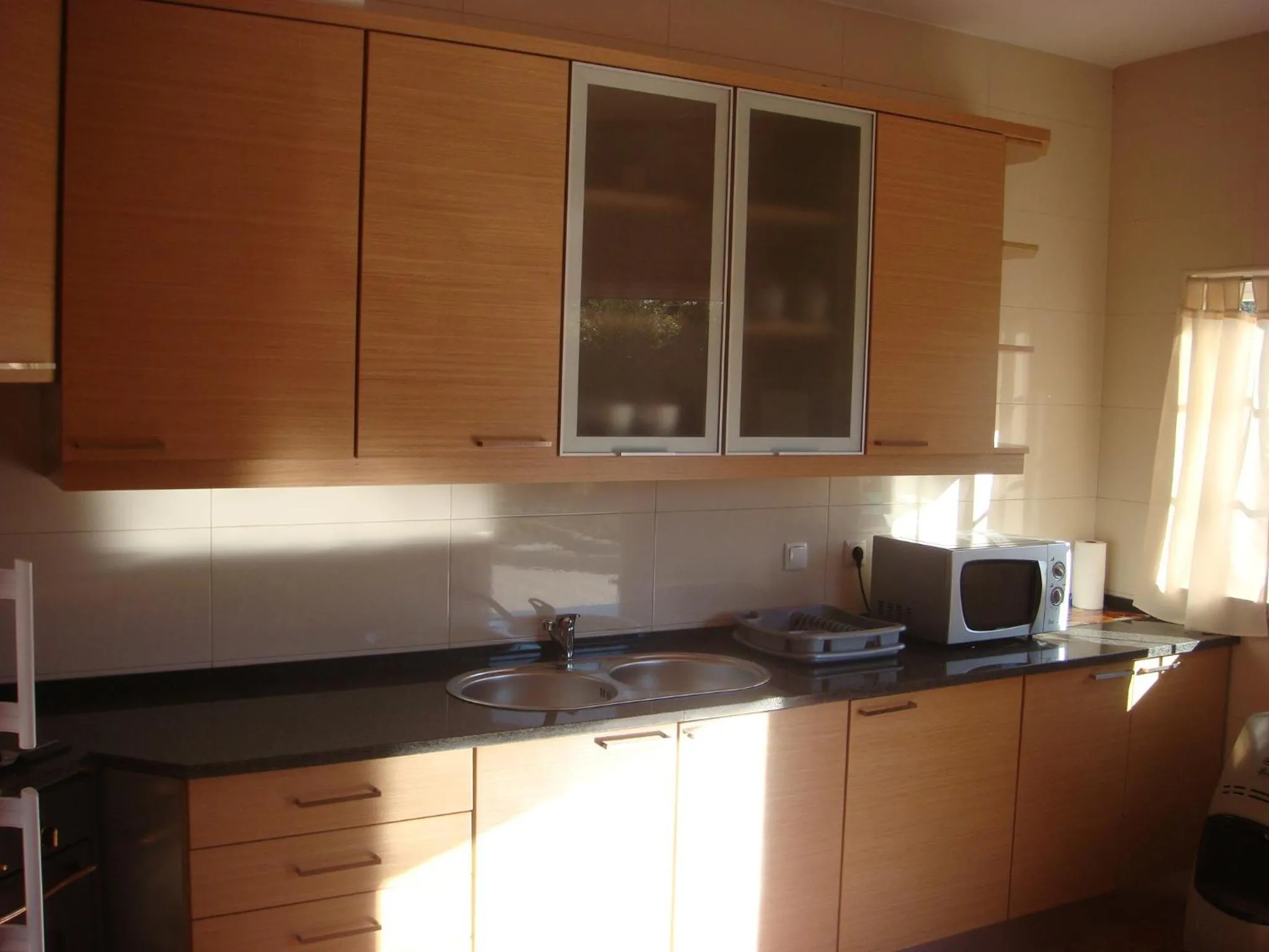 Kitchen or kitchenette in Casa De Hospedes Flor Do Jardim