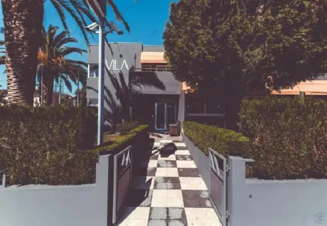 Property building in Vila Hotel By VimaHotels