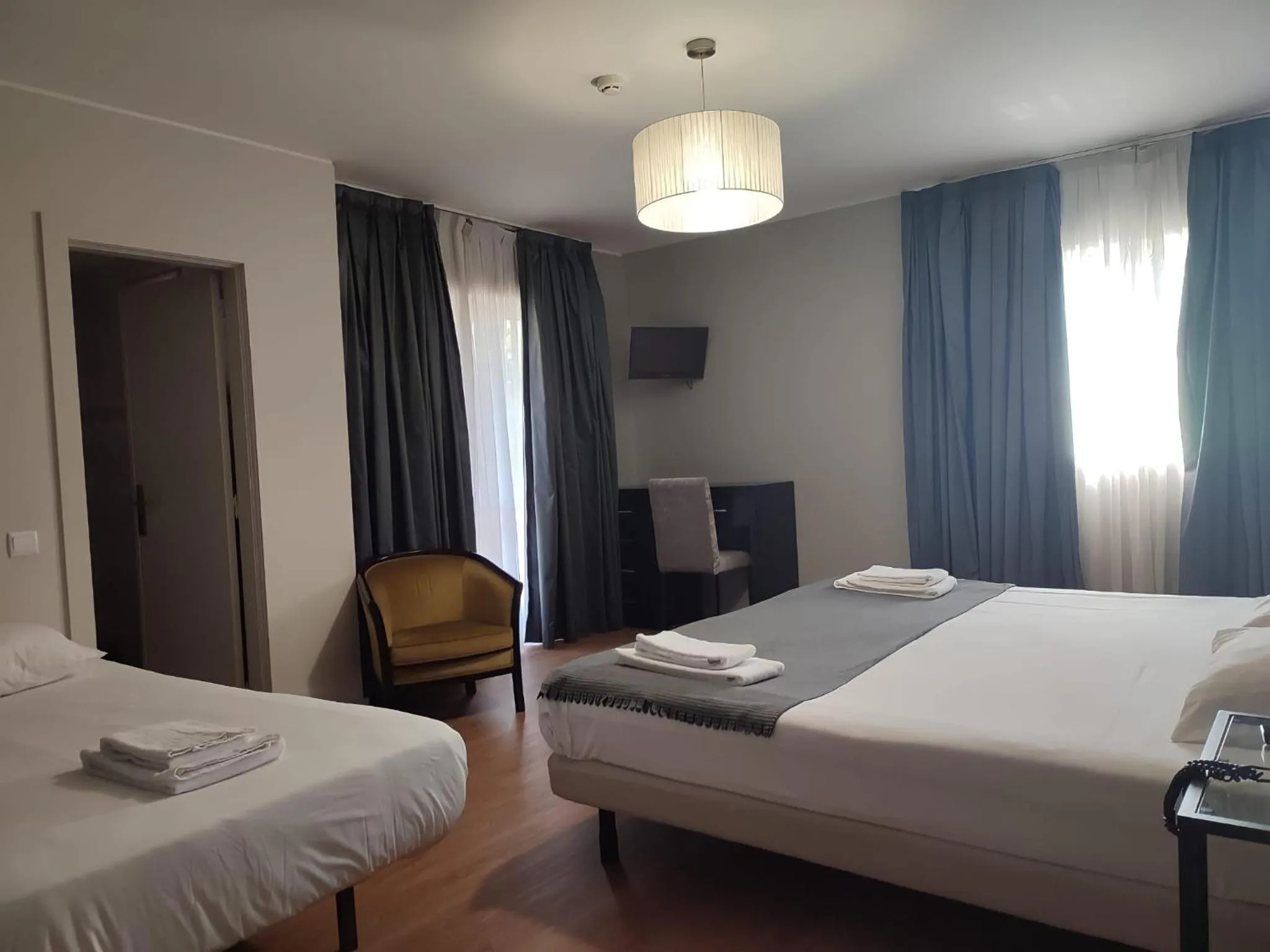 Bed in Vila Hotel By VimaHotels