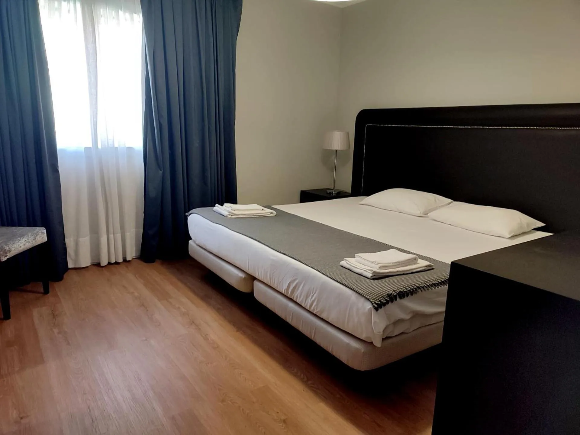 Bed in Vila Hotel By VimaHotels