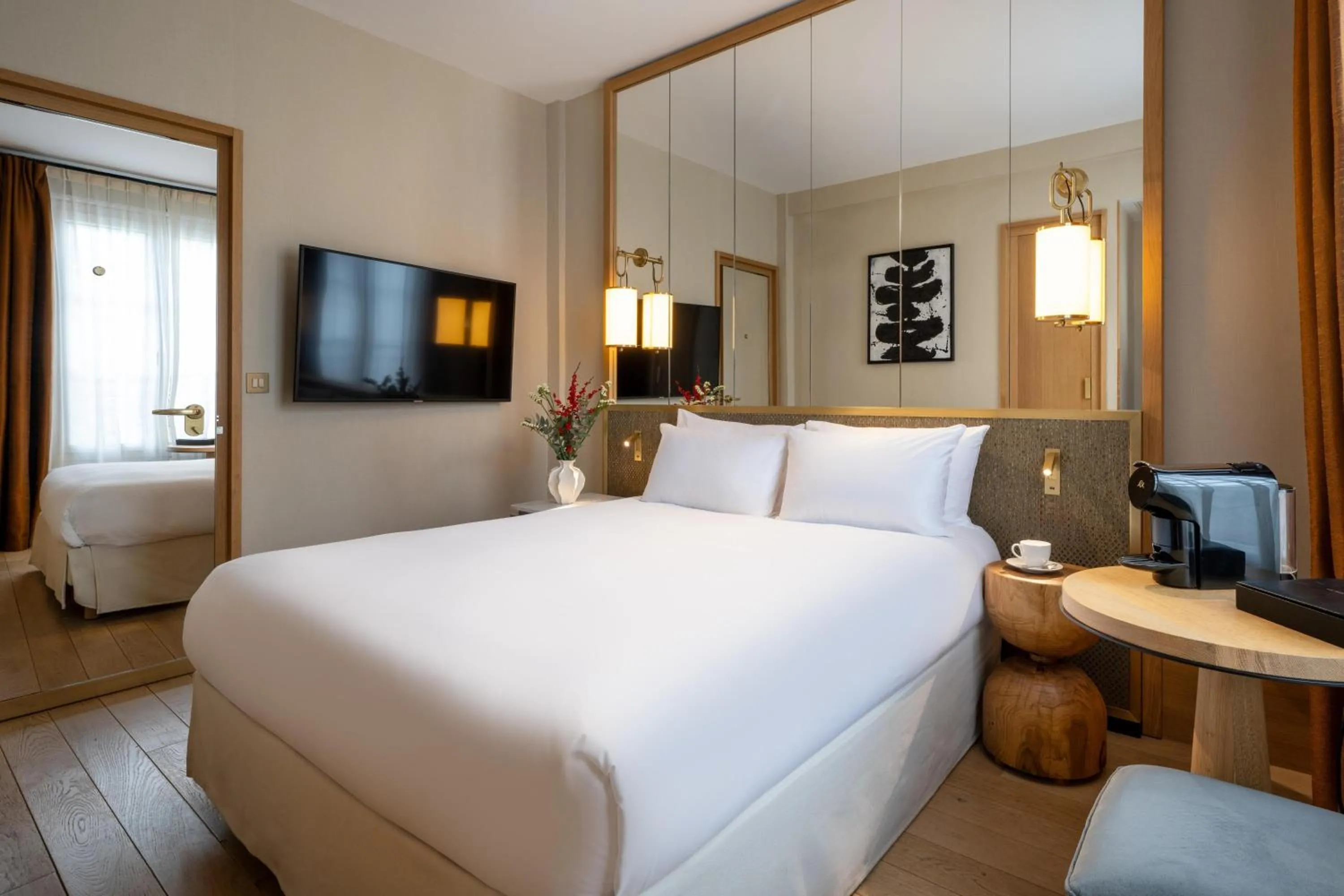 Bed in Le Belgrand Hotel Paris Champs Elysees, Tapestry By Hilton