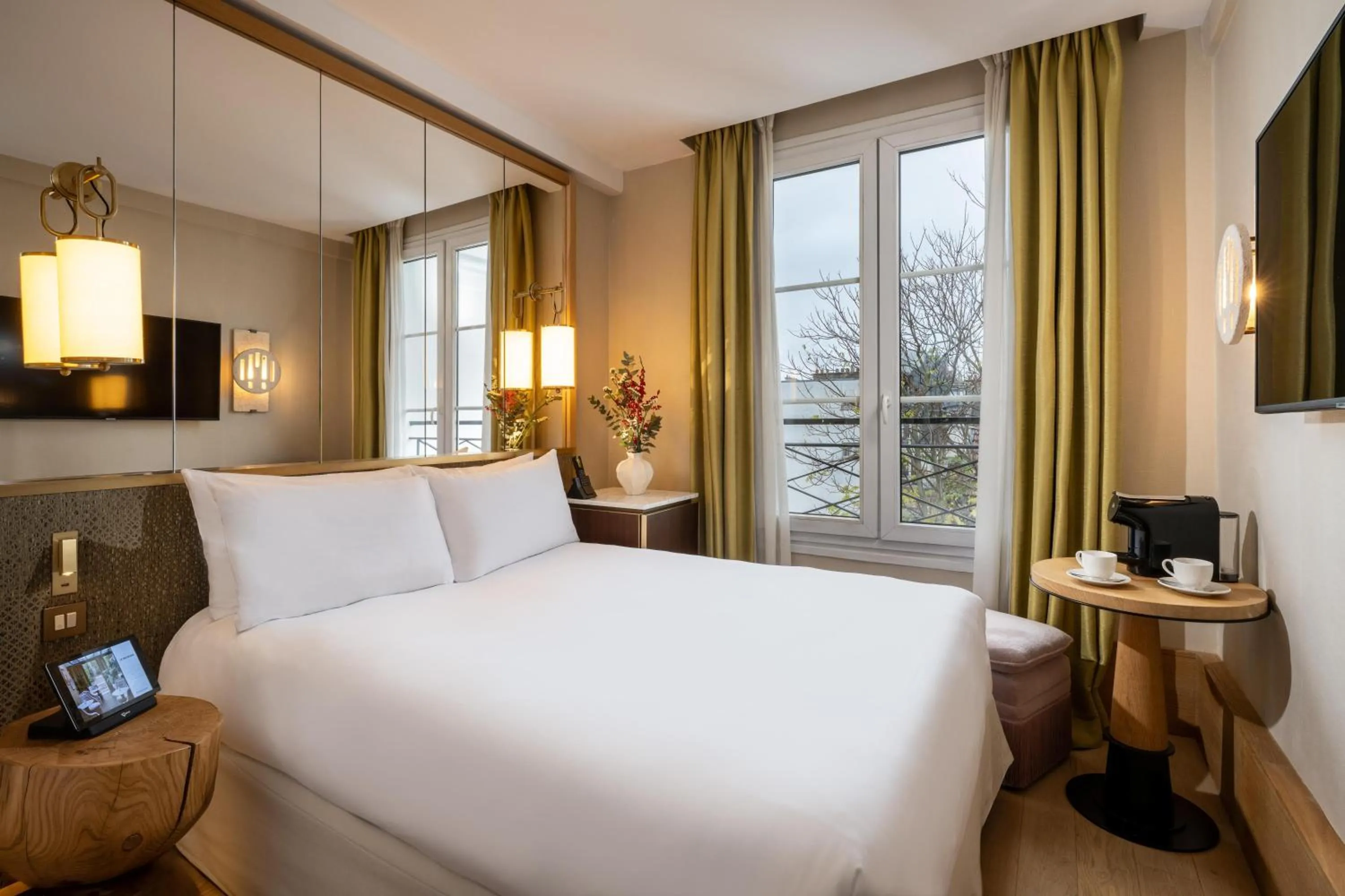 Bed in Le Belgrand Hotel Paris Champs Elysees, Tapestry By Hilton