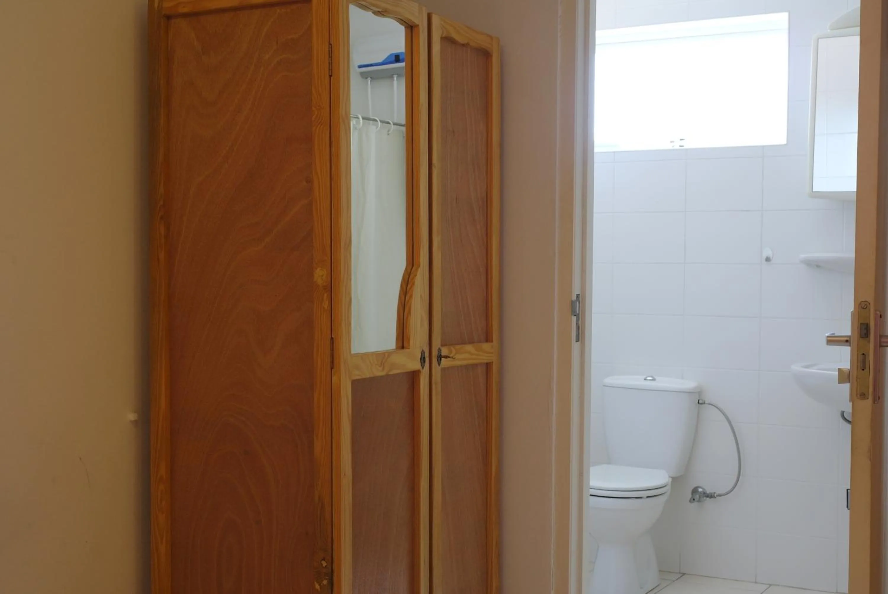 Toilet in Orange Rembrandt Studio Apartments