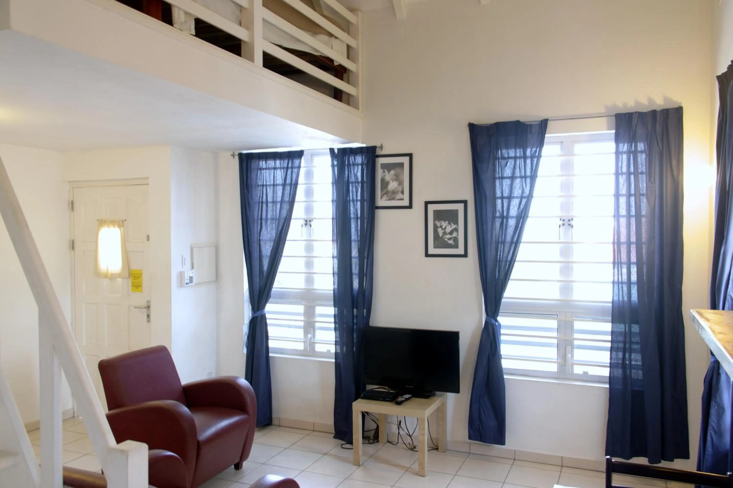 Living room in Orange Rembrandt Studio Apartments