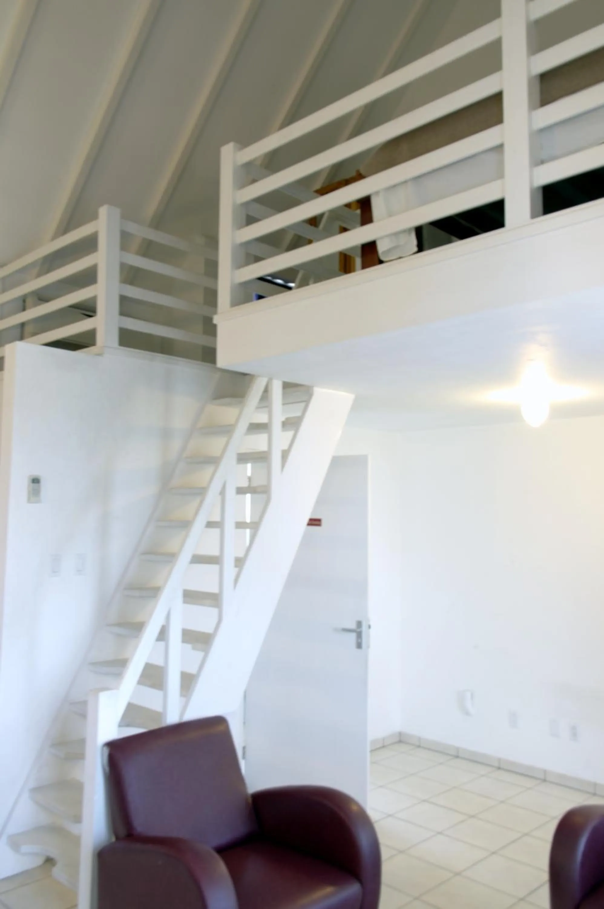 Living room in Orange Rembrandt Studio Apartments