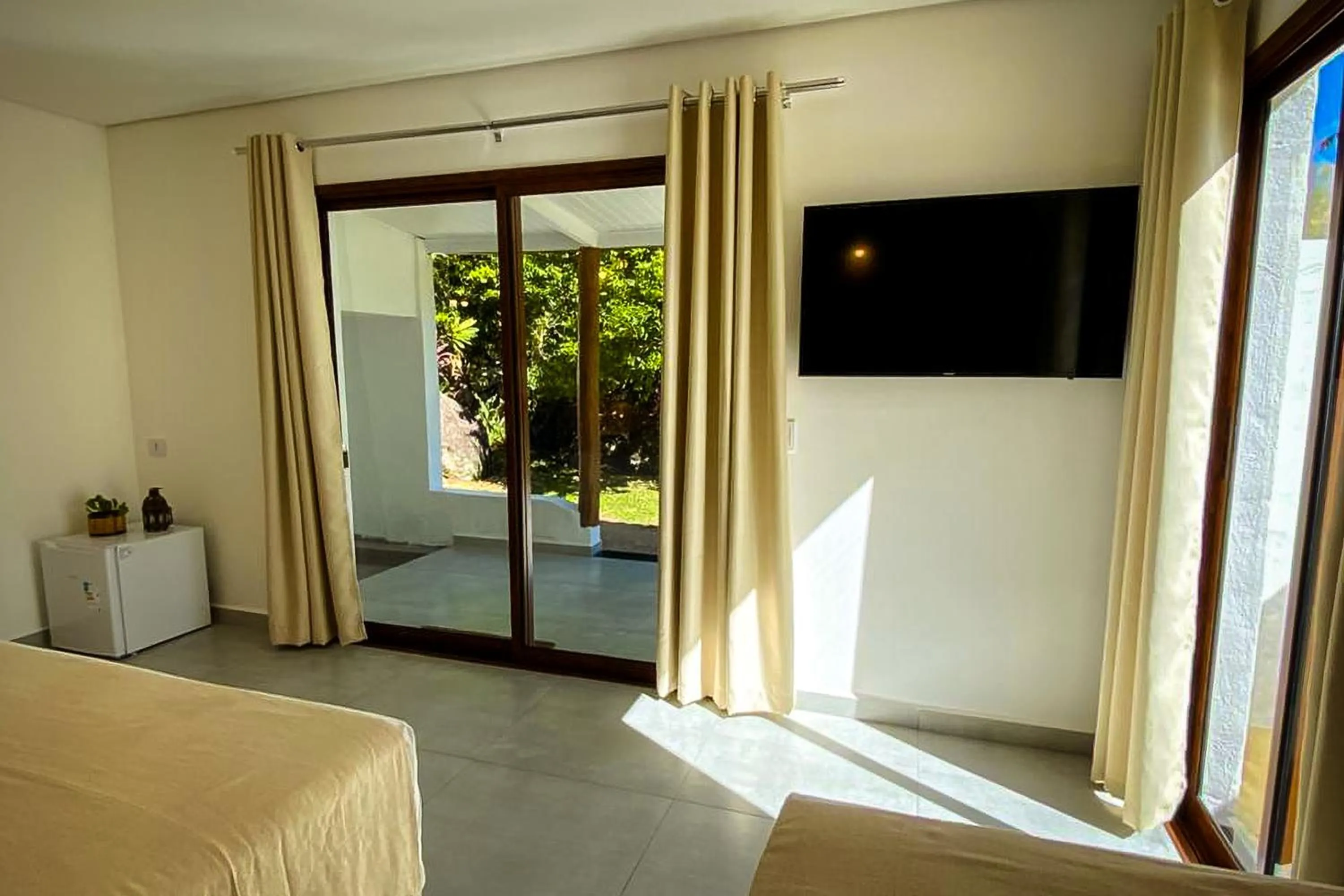 Bed in VELINN Pousada Bromelias