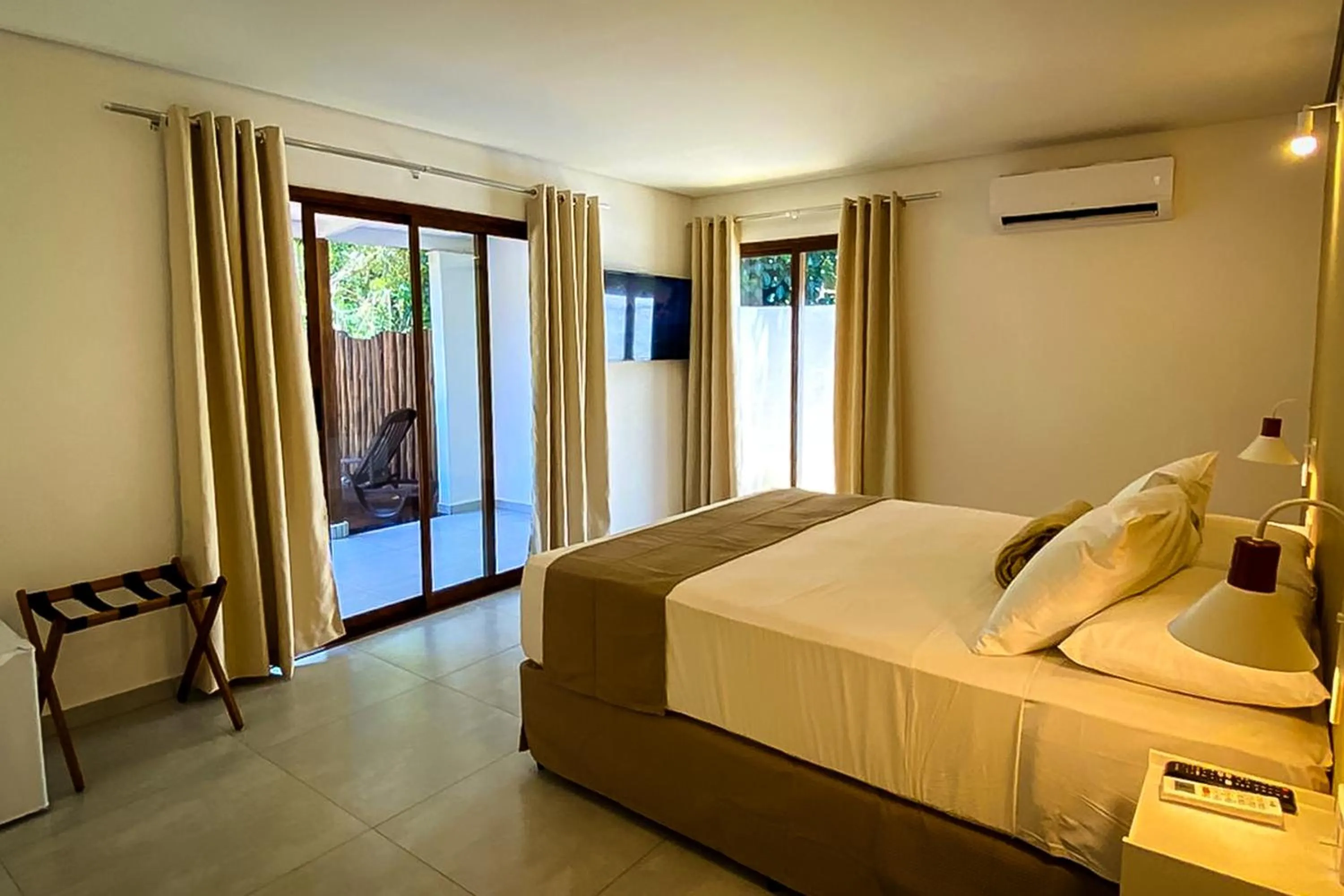 Bed in VELINN Pousada Bromelias