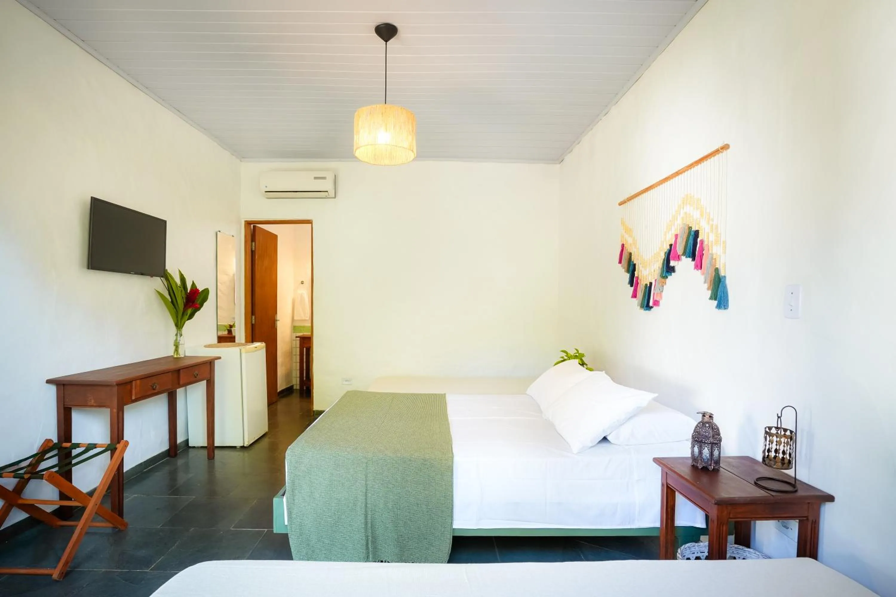 Bed in VELINN Pousada Bromelias