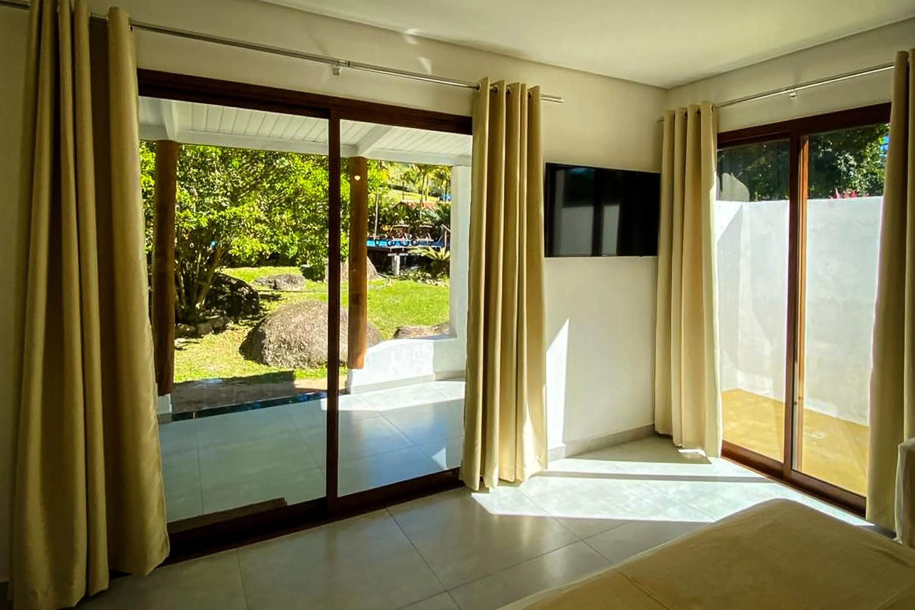 Bed in VELINN Pousada Bromelias