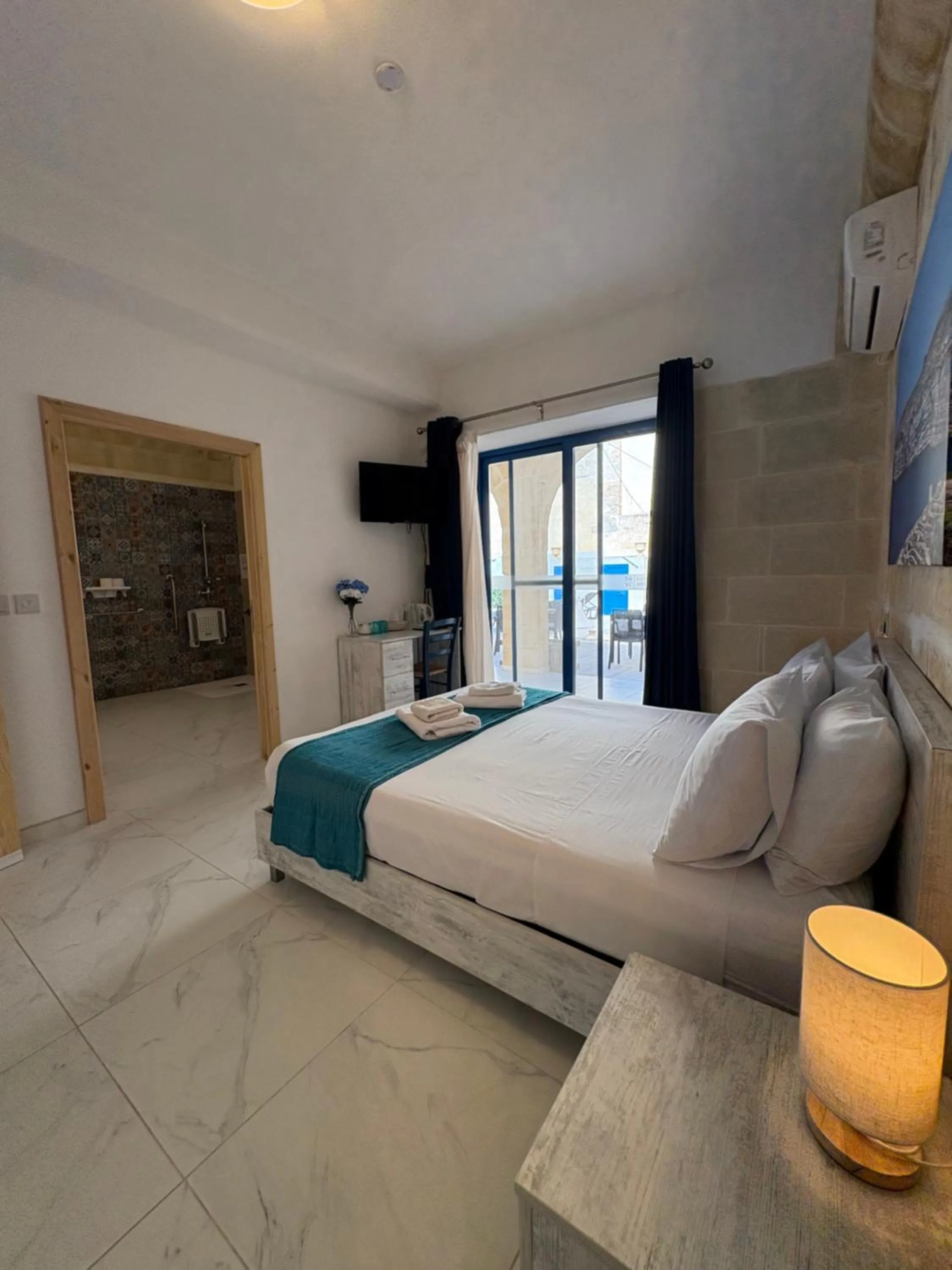 Bedroom in Fiftyfour West Boutique Living