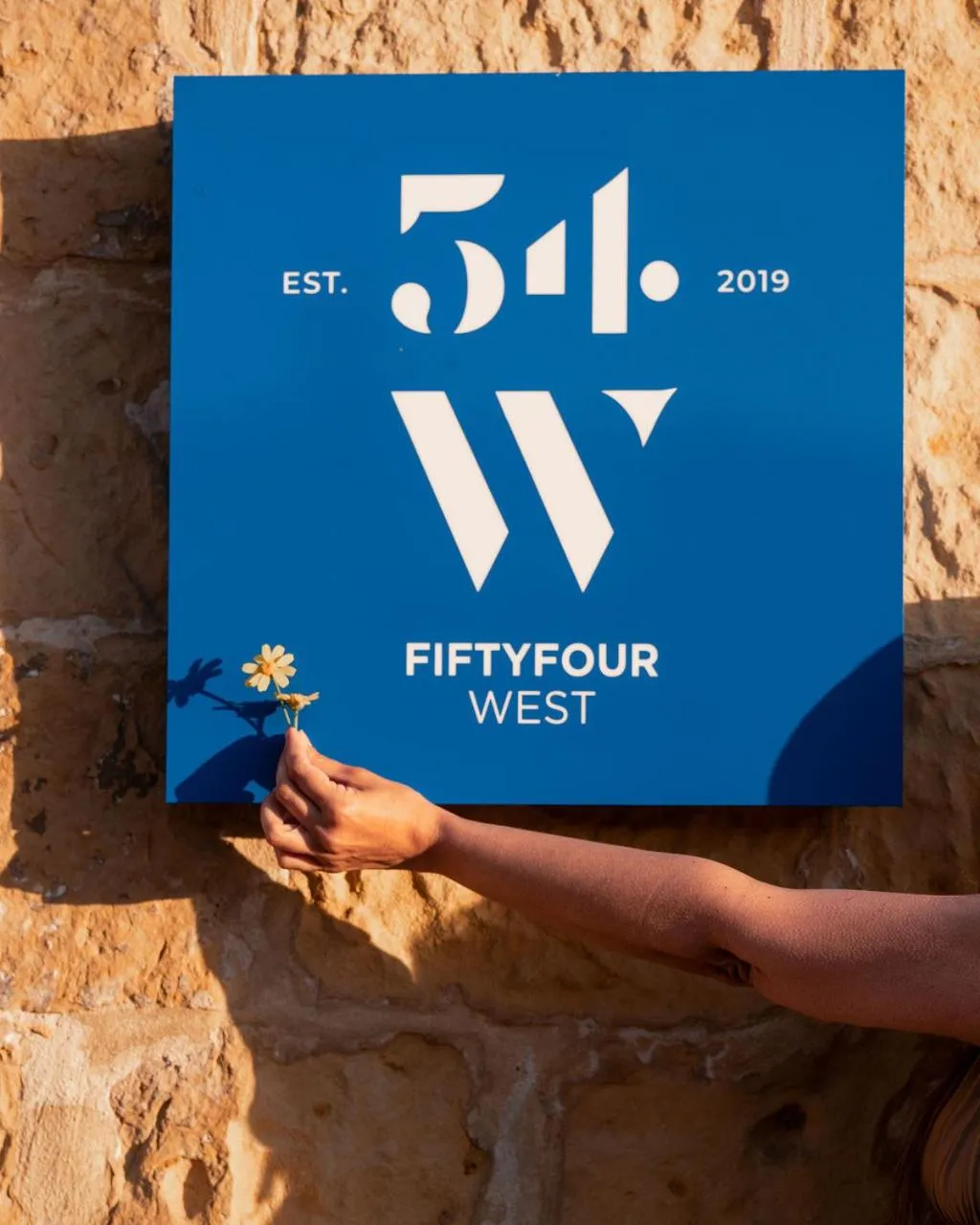 Property logo or sign in Fiftyfour West Boutique Living