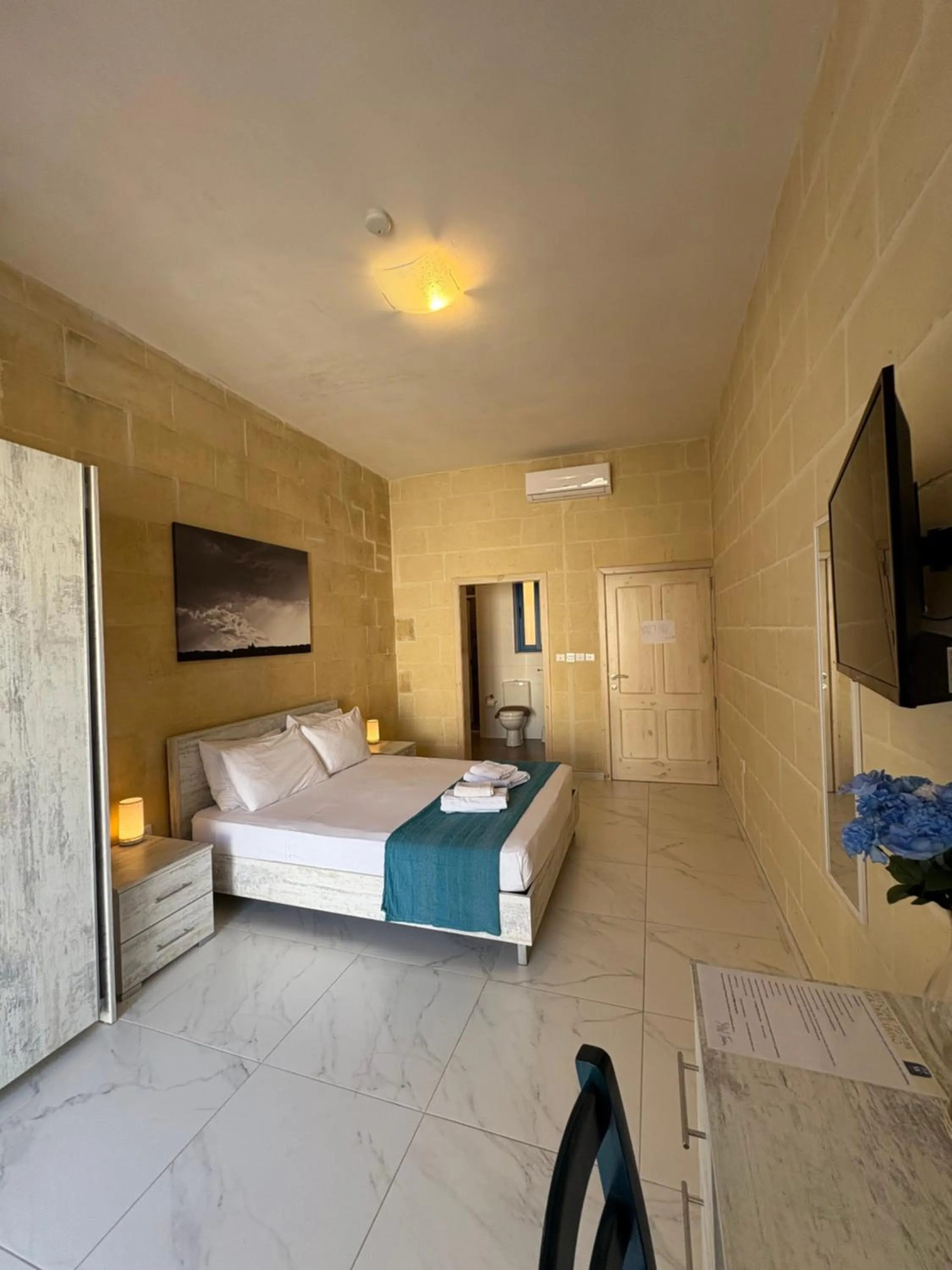 Bedroom in Fiftyfour West Boutique Living